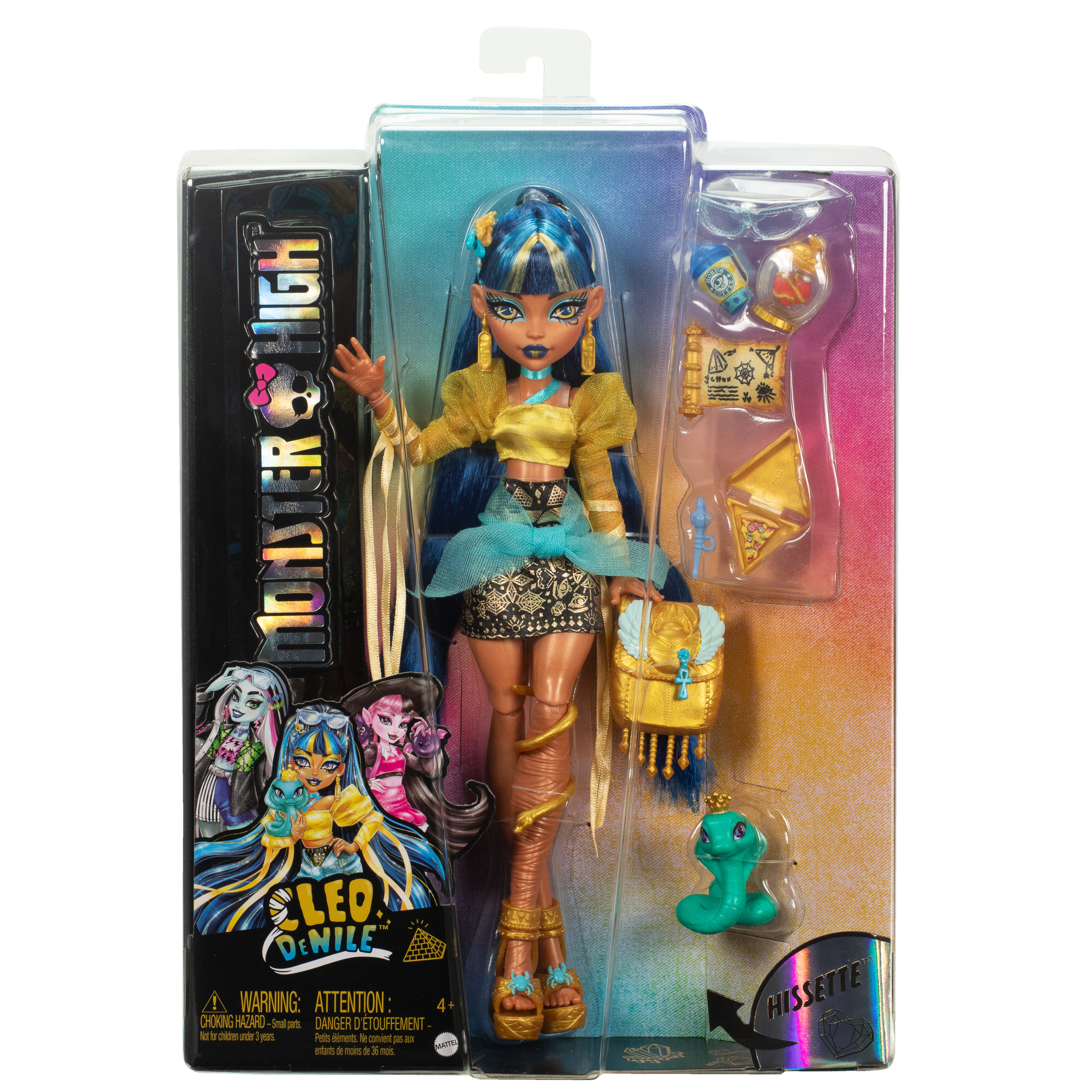 Lalka Monster High Cleo De Nile w pudełku. Ma niebieski i złoty strój, akcesoria i turkusowego węża.