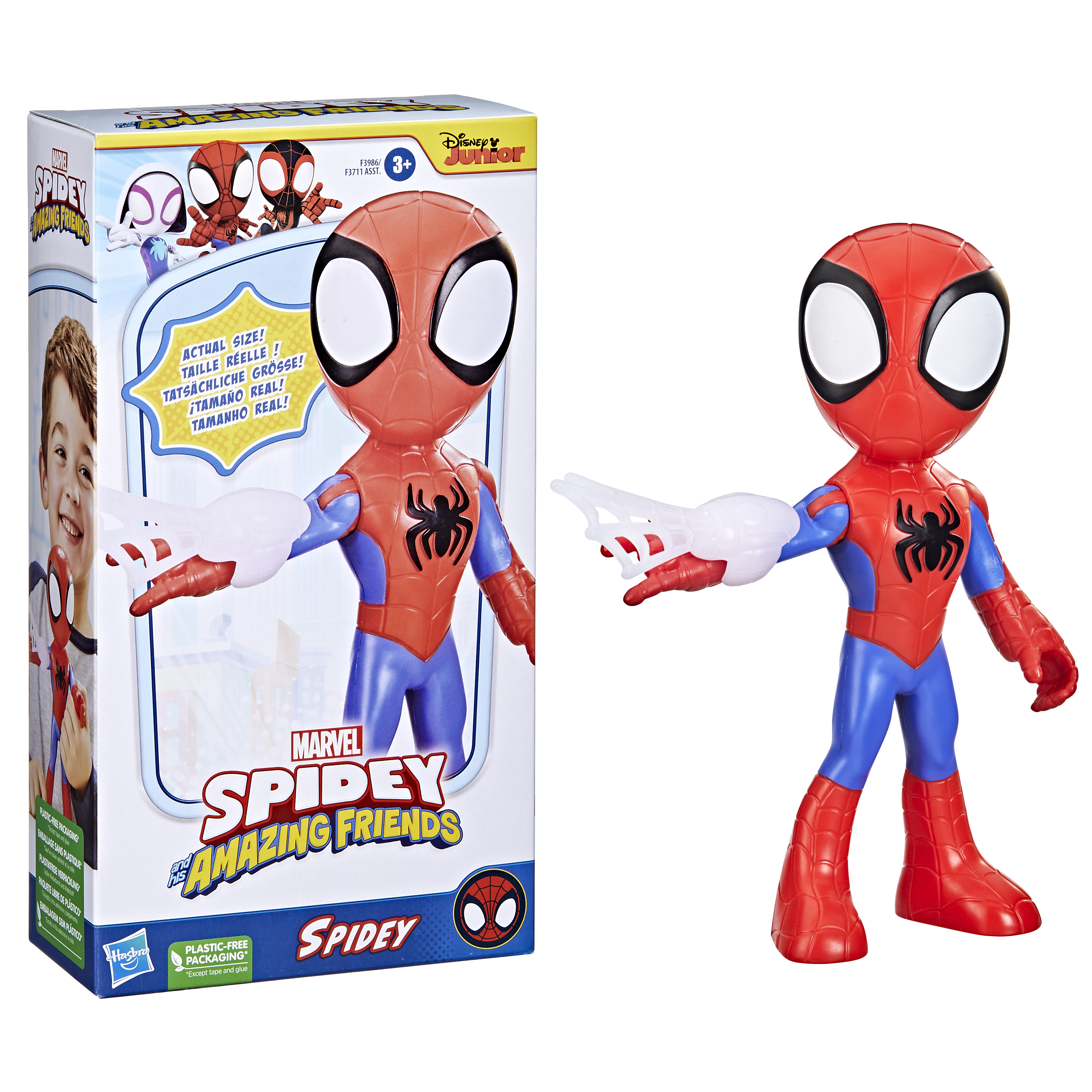 Figura de juguete de Spider-Man con caja. La figura es roja, azul y negra. La caja muestra a Spider-Man y amigos.
