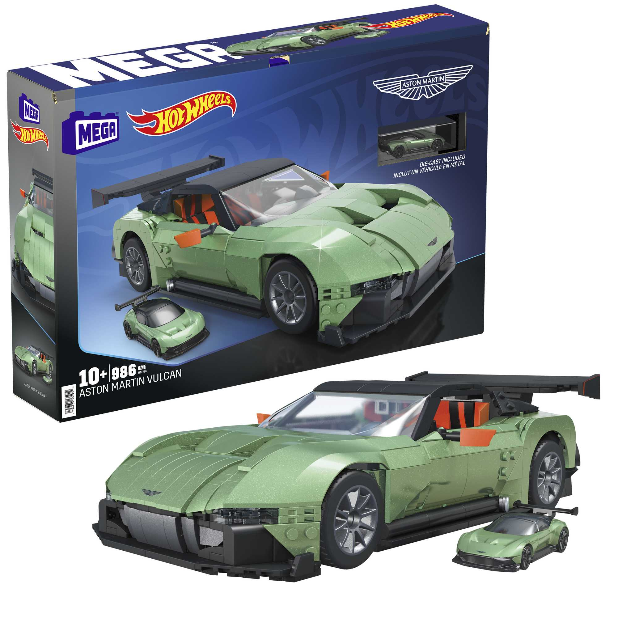 Zielony model Aston Martin Vulcan Hot Wheels i jego pudełko. Samochód stoi na czarnej powierzchni. Pudełko jest w tle.