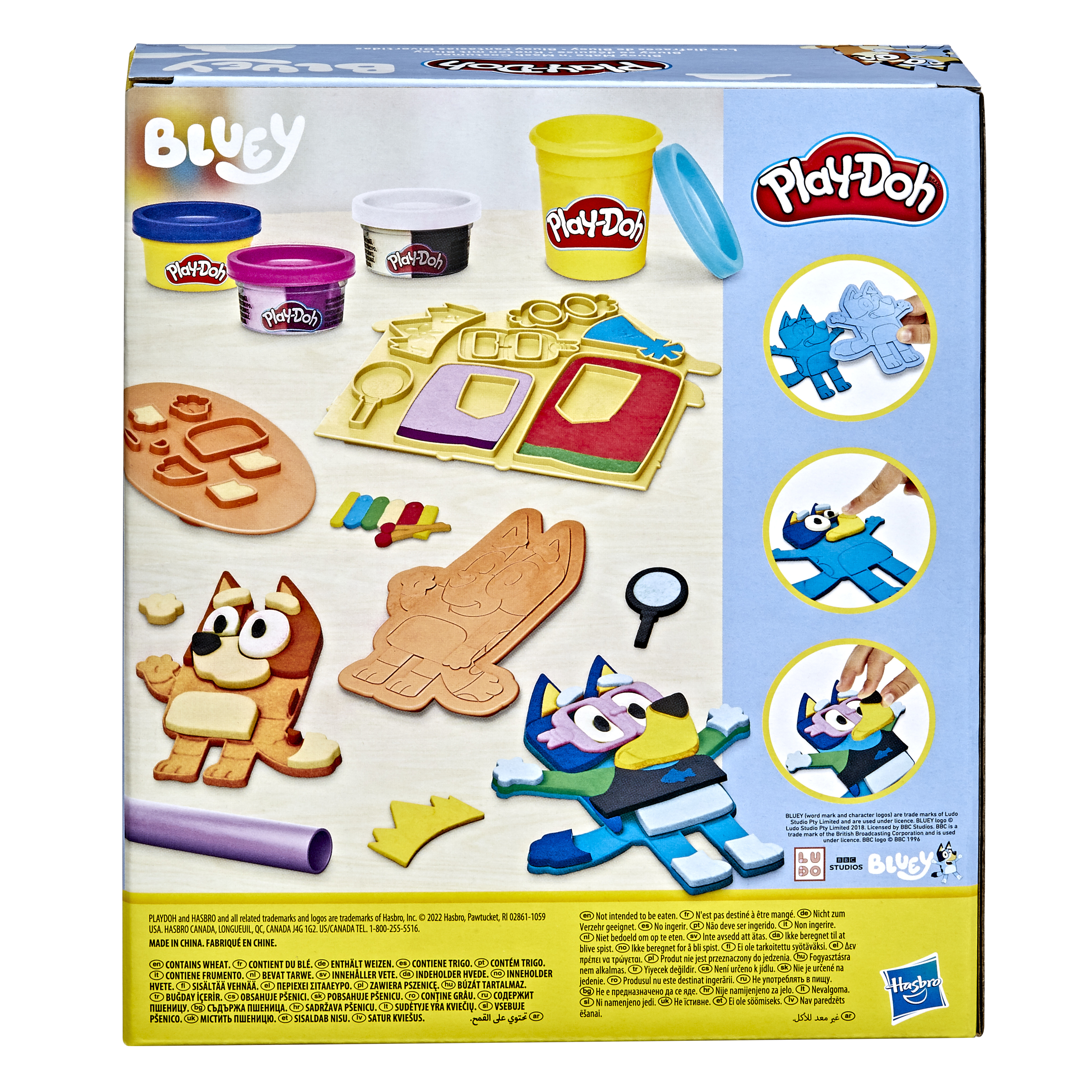 Caja del juego Play-Doh Bluey. Contiene botes de Play-Doh, cortadores y formas de personajes de Bluey. Colorido.