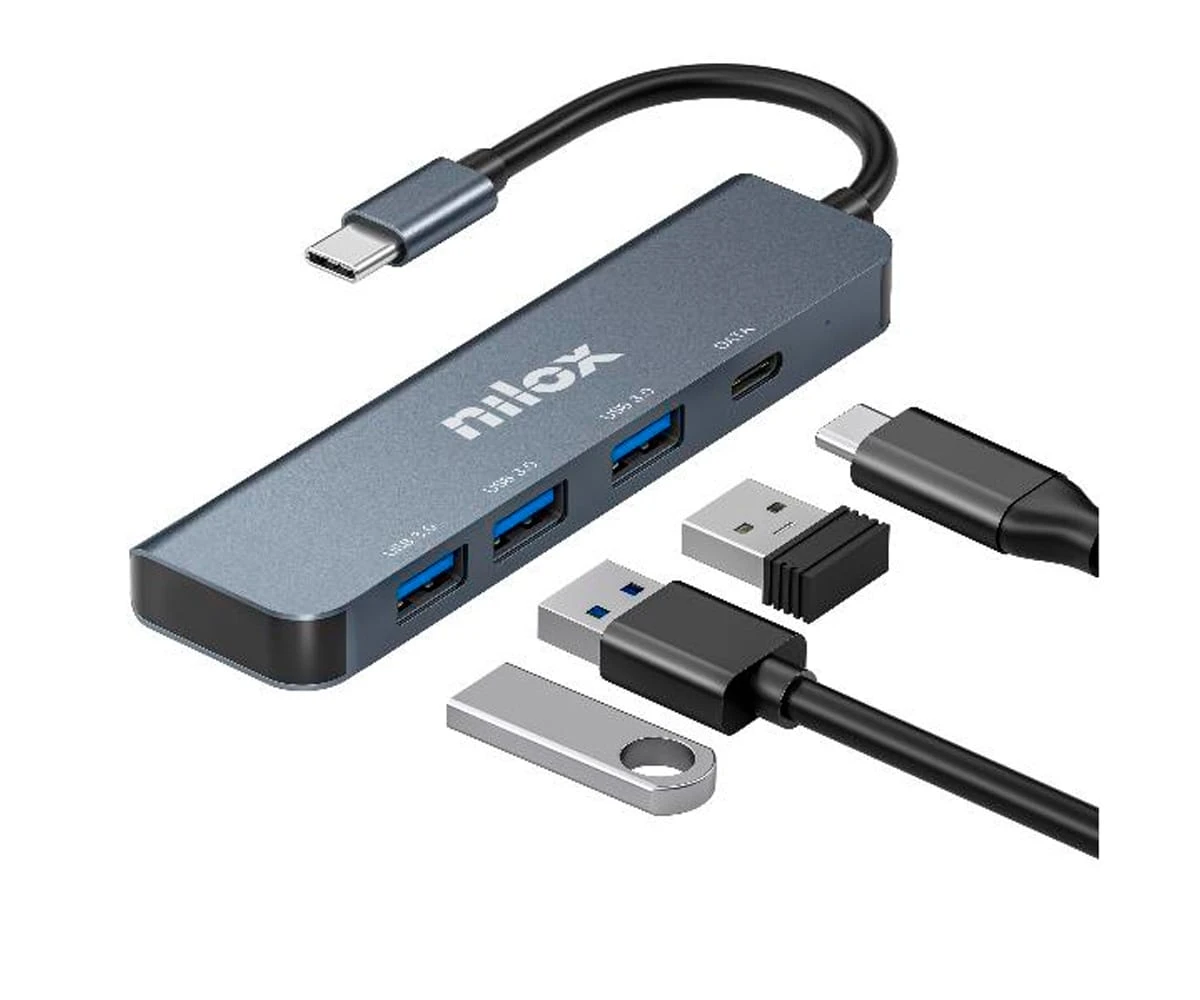 Ein grauer Nilox-USB-Hub mit verschiedenen Anschlüssen und Steckern, einschließlich USB-A, USB-C und einem USB-Stick.