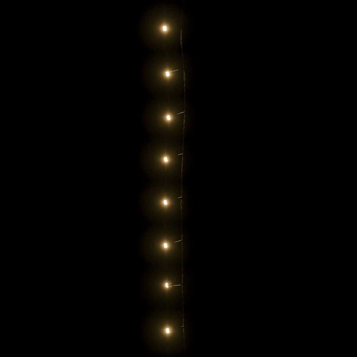 Vertikaler Strang aus kleinen, warmweißen Lichtern vor schwarzem Hintergrund. Die Lichter sind gleichmäßig verteilt und leuchten.