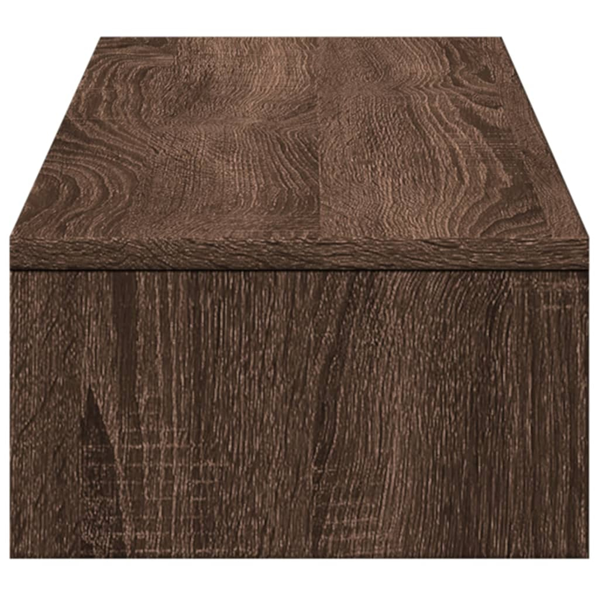 Nahaufnahme eines Holzschranks mit dunkelbraunem Finish. Die Oberseite zeigt Maserungsmuster. Die Vorderseite ist vertikale Maserung.