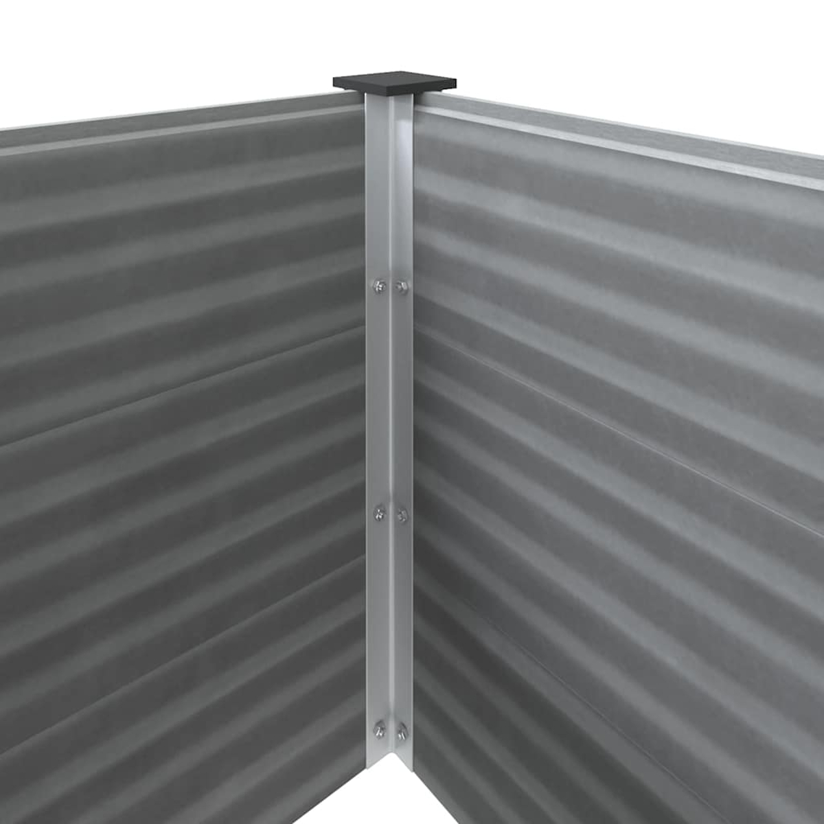 Nahaufnahme einer Ecke eines verzinkten Metall-Gartenbeets. Die Ecke wird von einer vertikalen Stütze und einer kleinen schwarzen Kappe zusammengehalten.