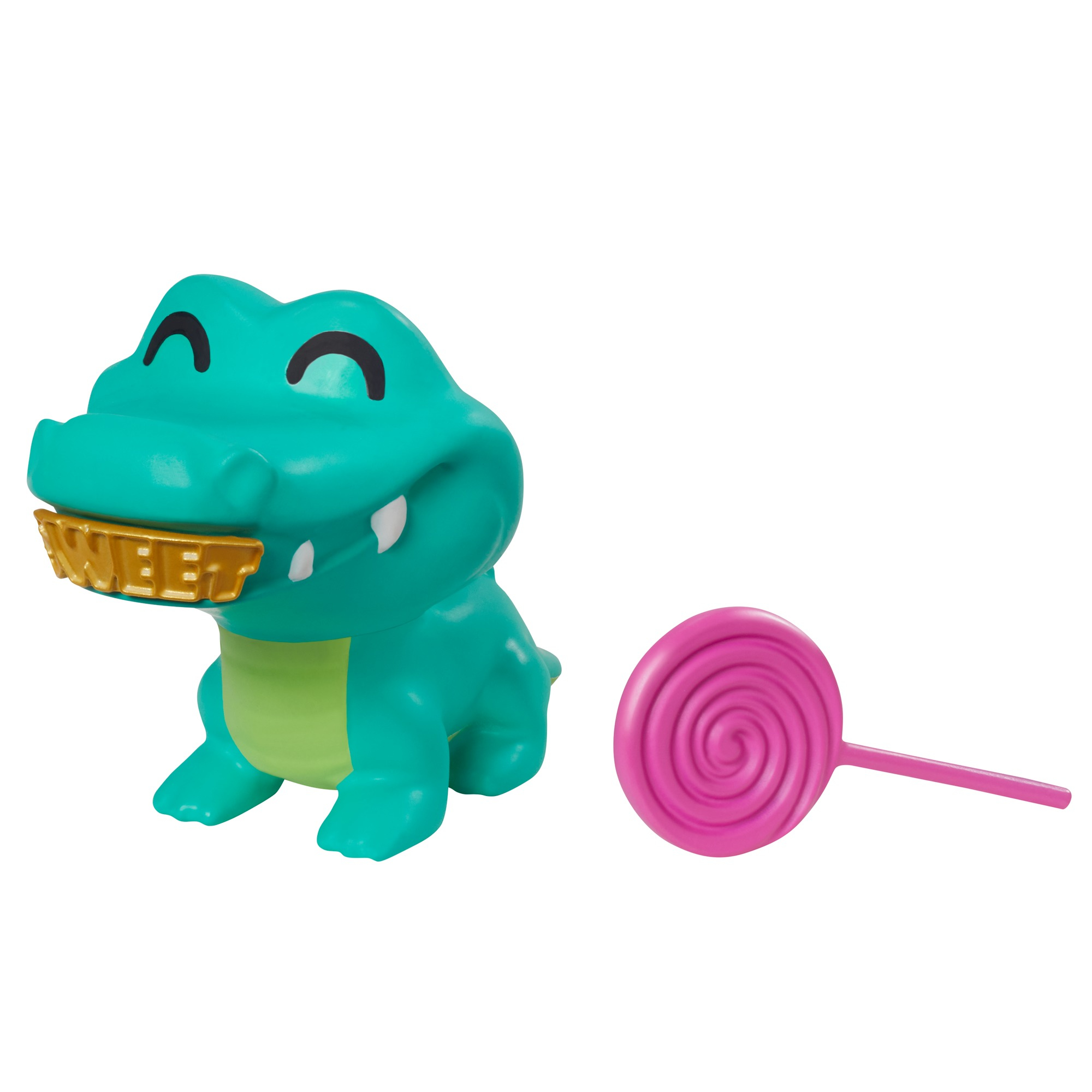 Tealowa zabawka aligatora ze złotym znakiem 'SWEET' w ustach, obok różowego lizaka.
