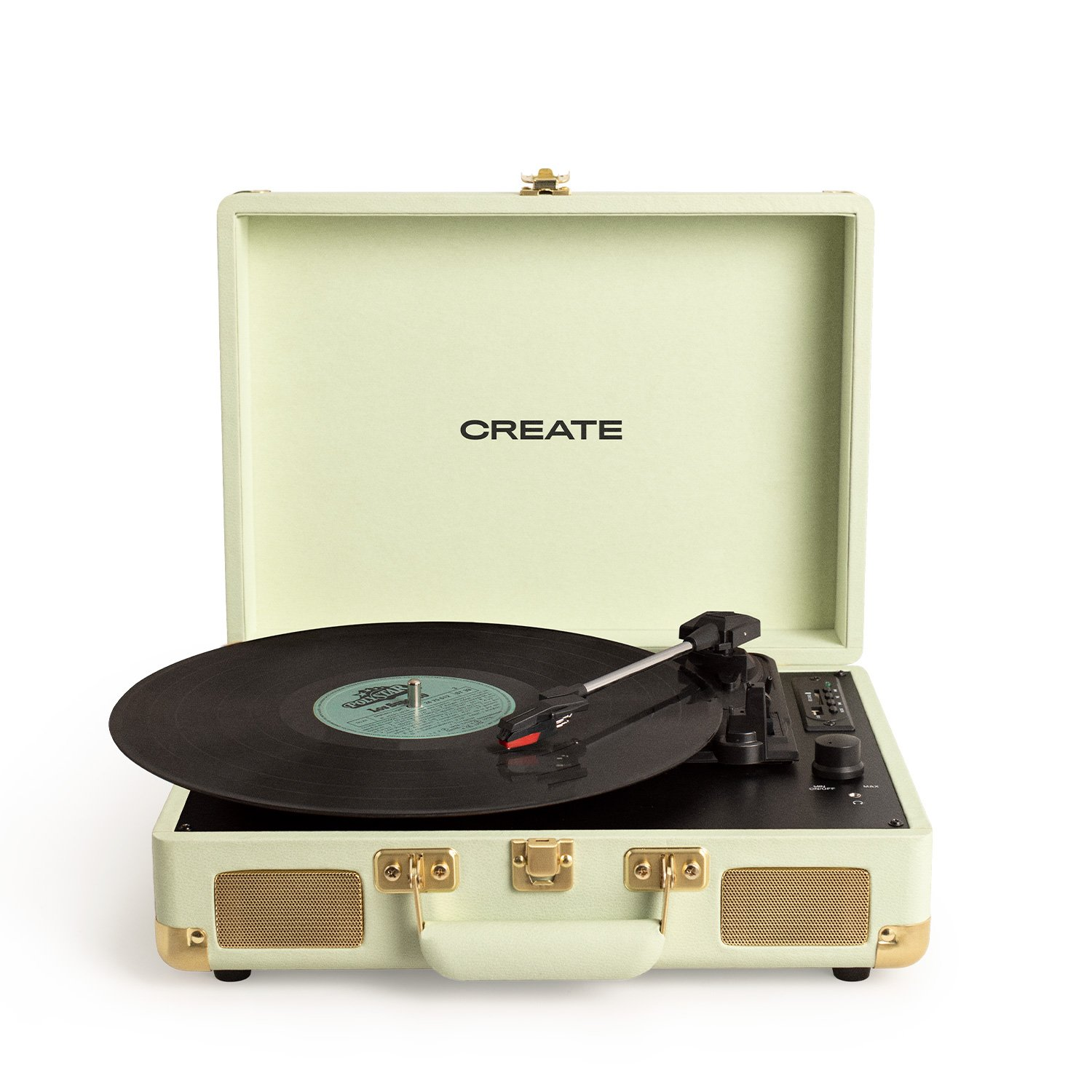 Un tocadiscos verde menta está abierto, un disco de vinilo negro está sonando, detalles dorados y la palabra 'CREATE' visible.