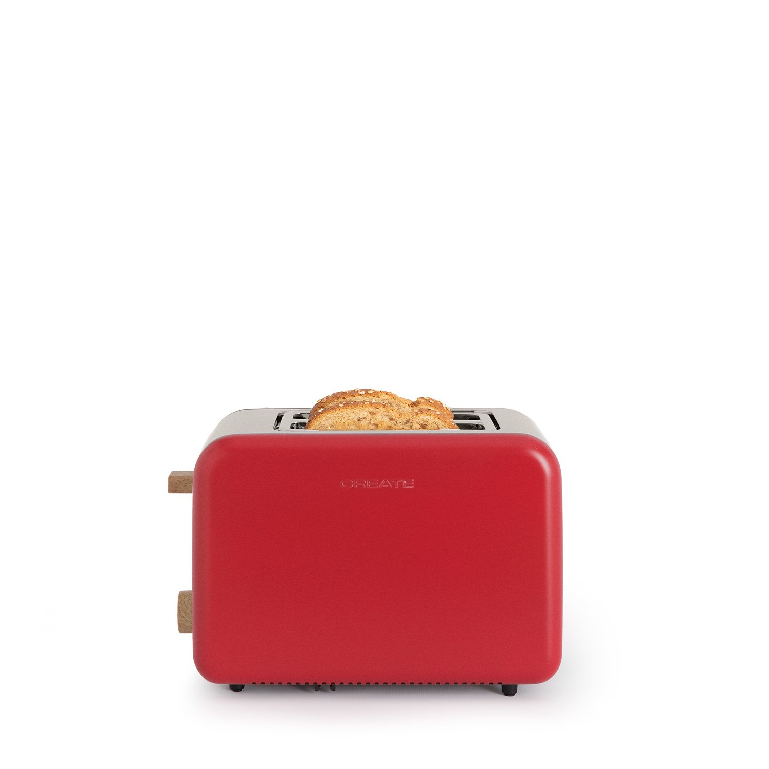 Una tostadora roja con pan dentro. Tiene detalles laterales de madera y la palabra 'CREATE' al frente. El fondo es blanco.