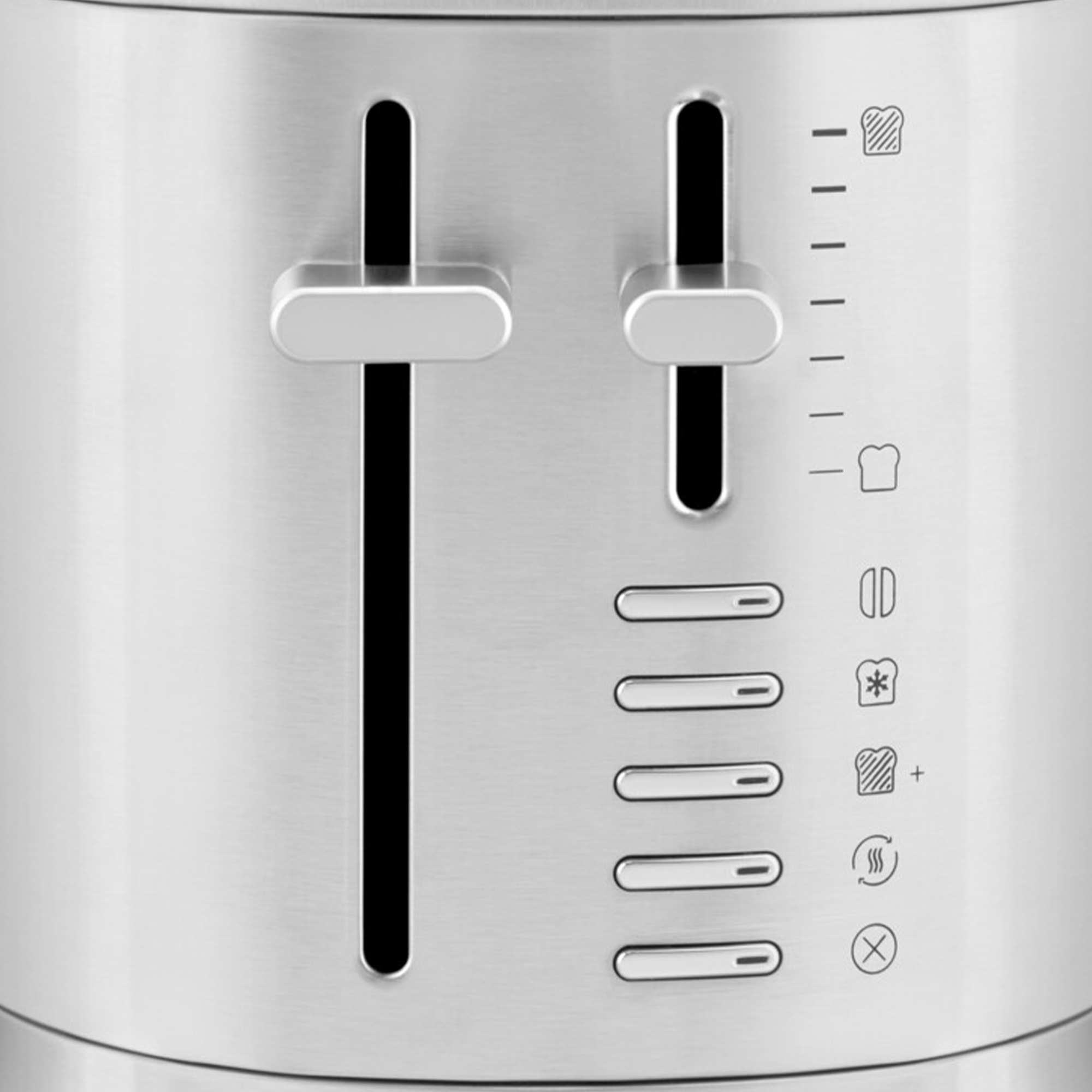 Nahaufnahme eines silbernen Toasters. Bedienelemente und Schlitze sind sichtbar. Die linke Seite hat einen Hebel.