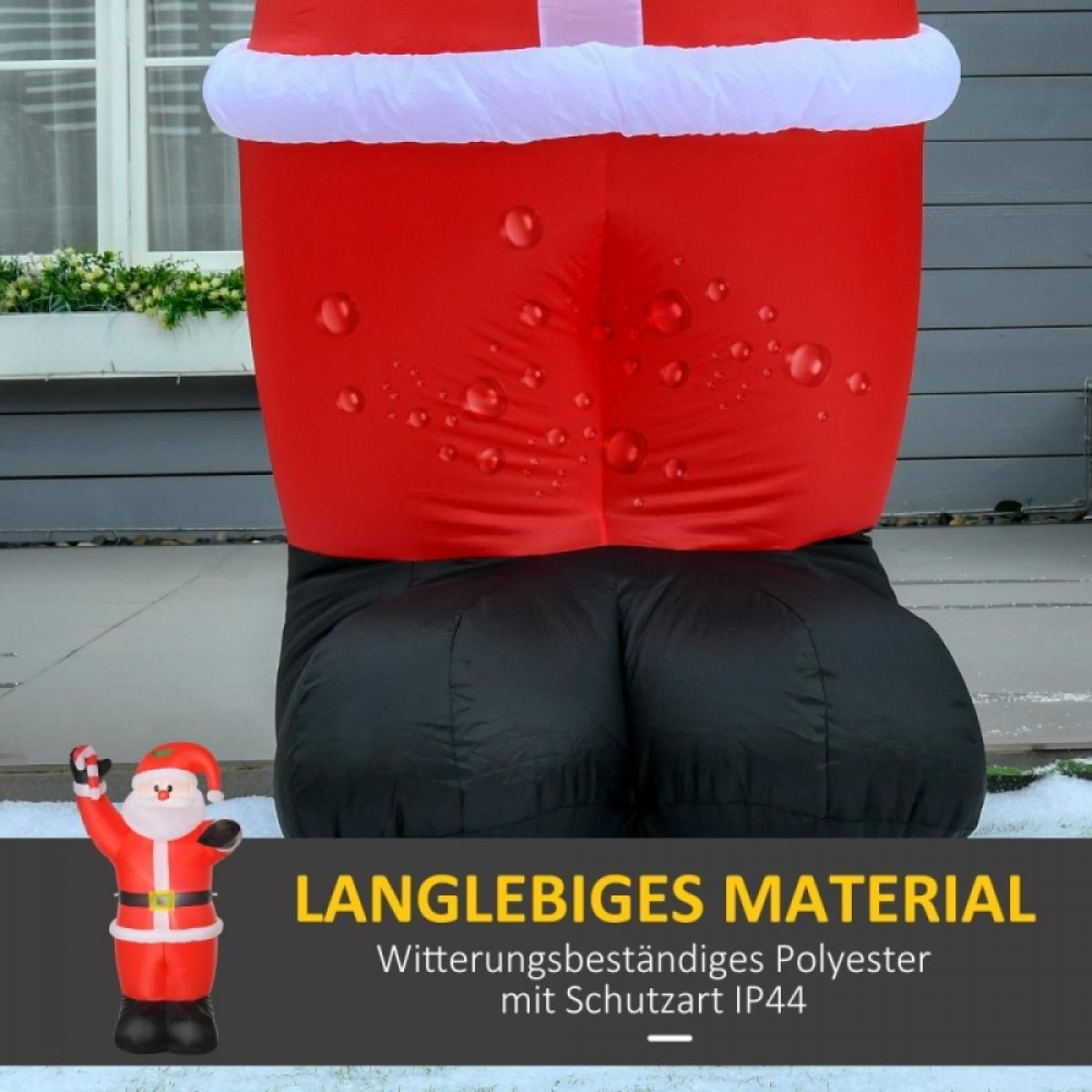 Aufblasbarer Weihnachtsmann mit rotem Anzug und schwarzen Stiefeln, Wassertropfen auf der Oberfläche, kleine Santa-Figur.