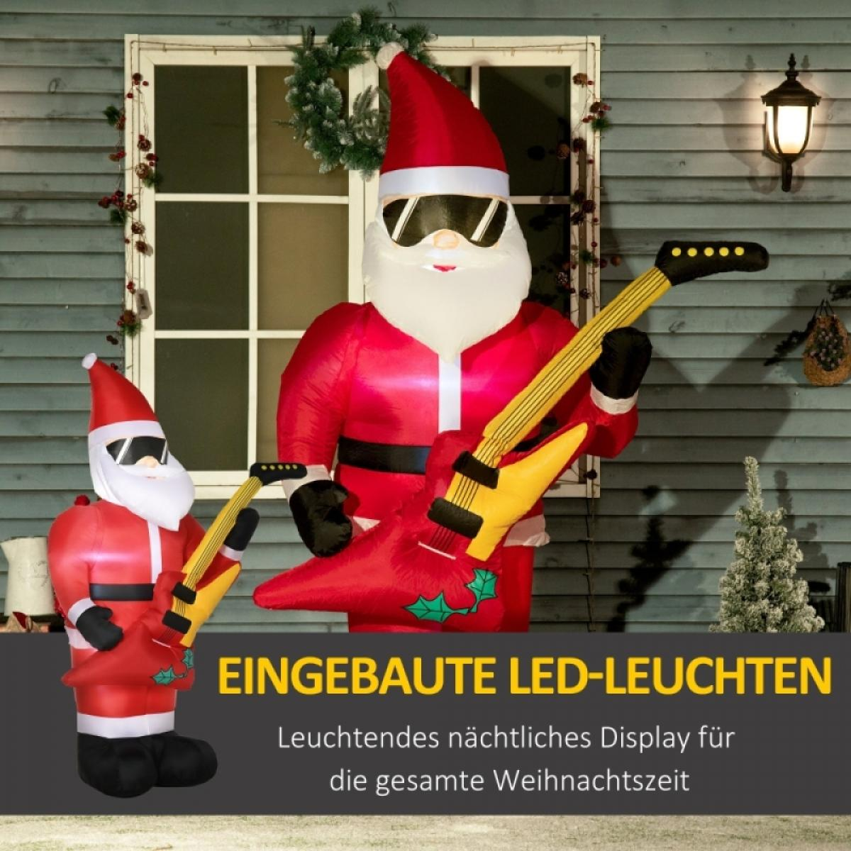 Aufblasbare Weihnachtsmannfiguren, eine große und eine kleine, die Gitarren halten. Beide tragen Sonnenbrillen und rote Anzüge.