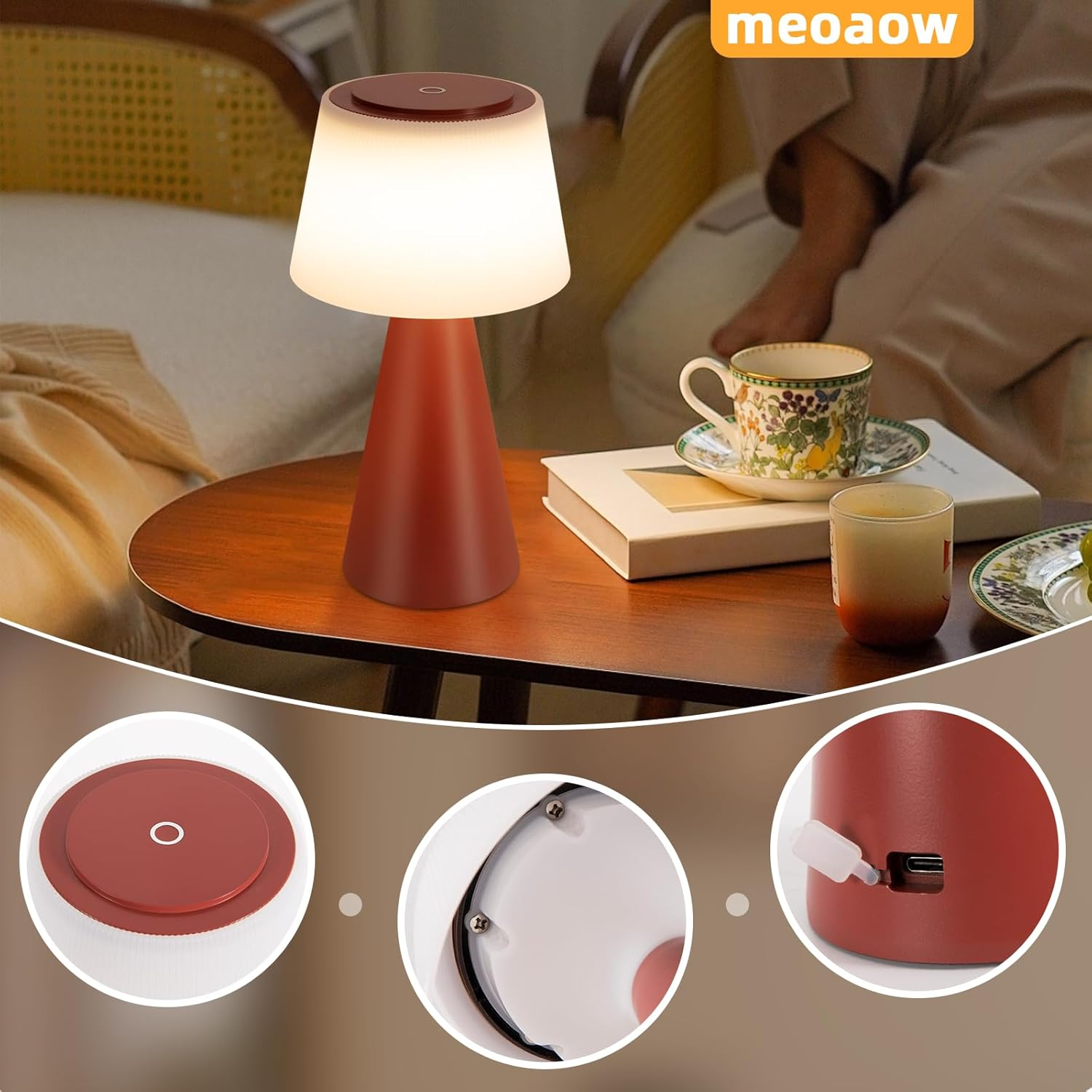 Una lampada da tavolo rossa con paralume bianco. Una tazza di caffè, un libro e una persona sullo sfondo.