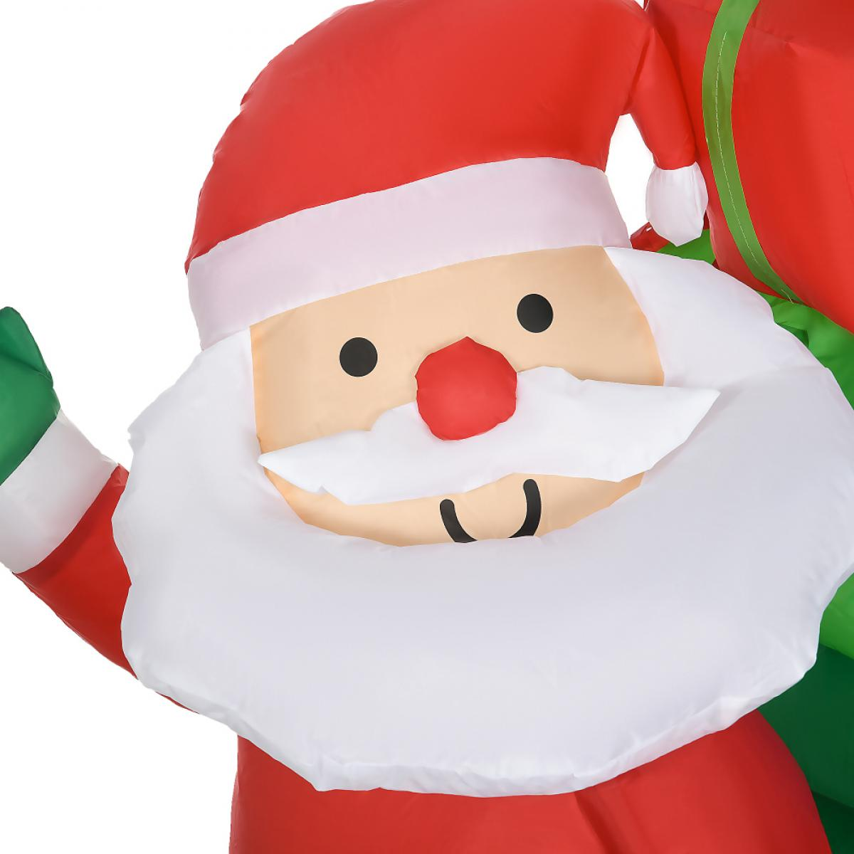 Aufblasbarer Weihnachtsmann mit rotem Hut, weißem Bart und Geschenktüte, grünem Handschuh und rotem Anzug.