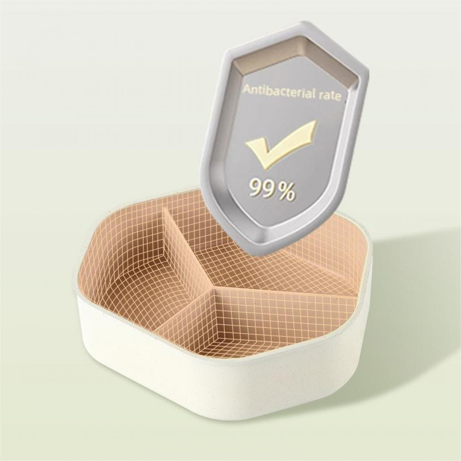 Ein weißer, unterteilter Behälter mit einem silbernen Schild, das eine antibakterielle Rate von 99 % anzeigt.