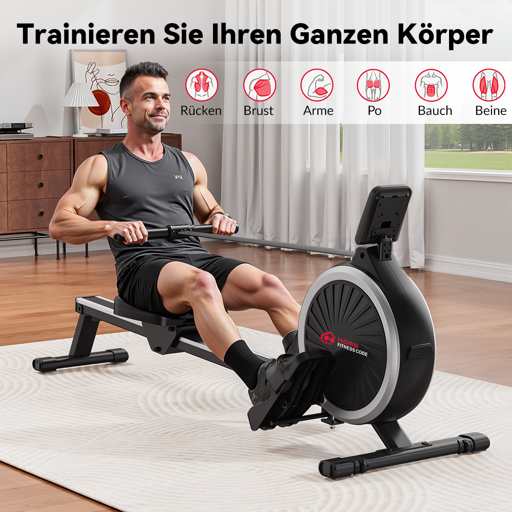 Mężczyzna wiosłuje na maszynie. Maszyna jest czarna z ekranem. Mężczyzna ma na sobie czarne szorty i szarą koszulkę.