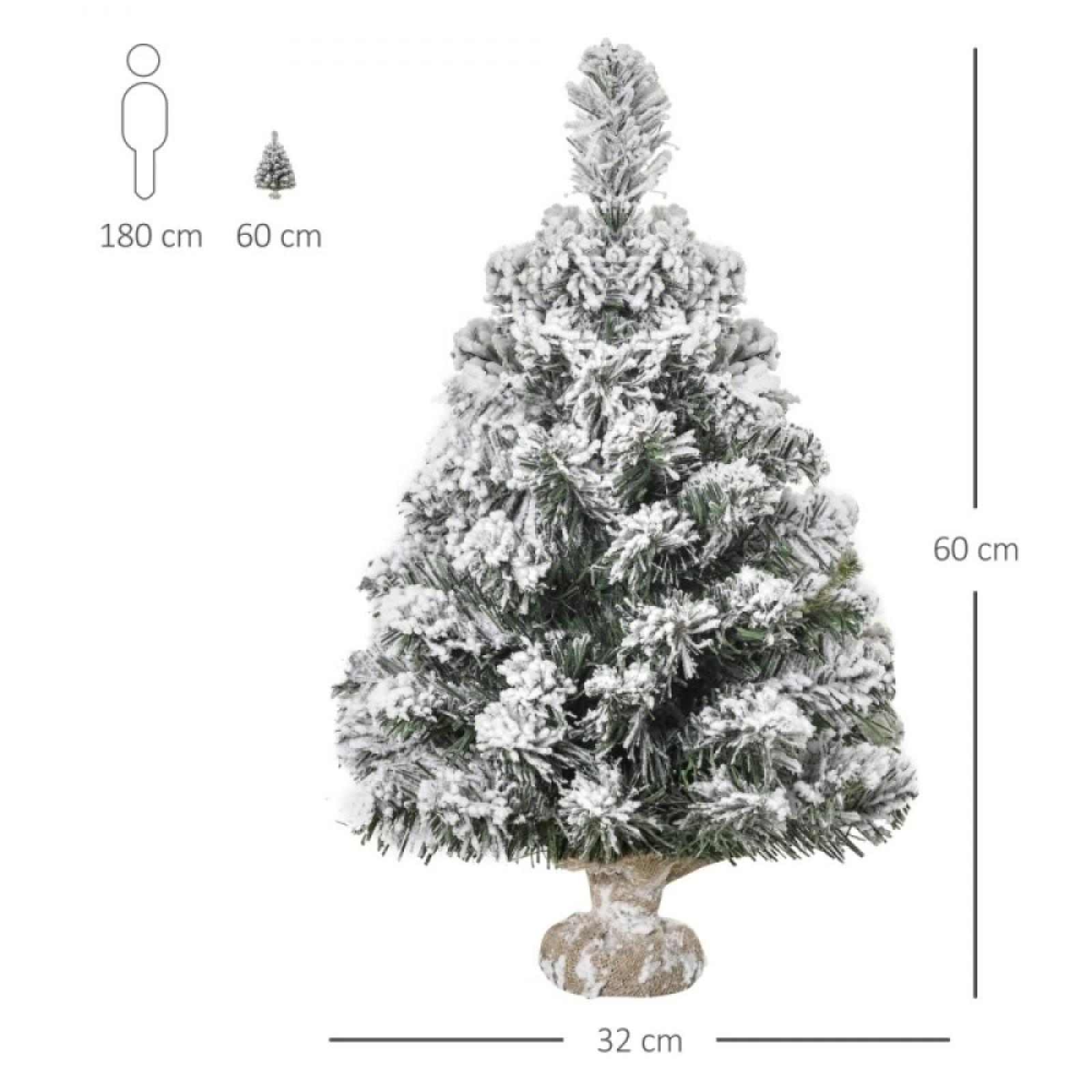 Ein kleiner künstlicher Weihnachtsbaum, schneebedeckt, auf hellbraunem Sockel. Maße sind angegeben.
