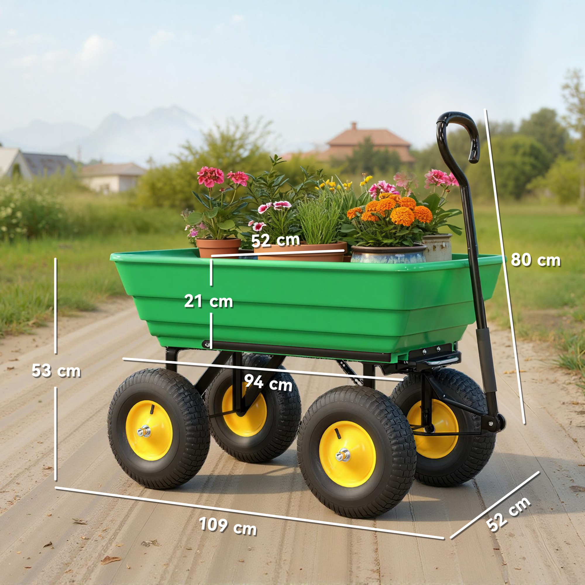 Un carrello verde con piante su uno sterrato. Il carrello ha ruote nere con centri gialli. Case e montagne sullo sfondo.