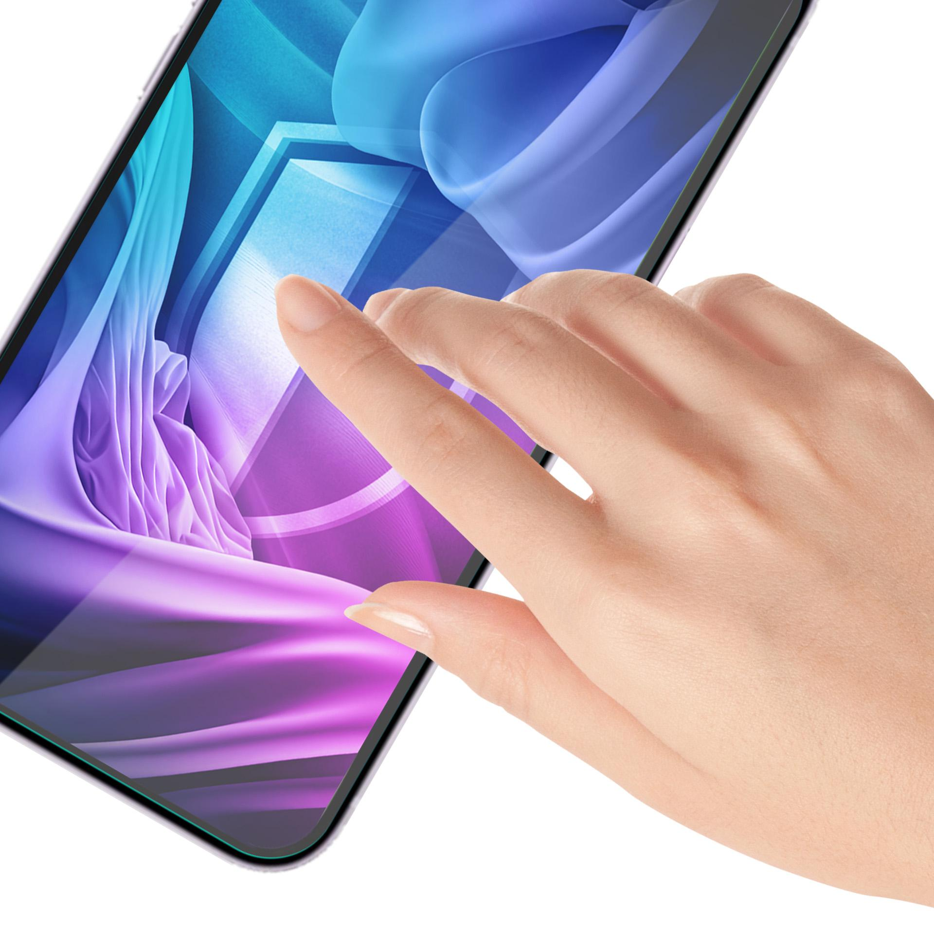 Dłoń dotyka ekranu telefonu. Ekran wyświetla kolorowy, abstrakcyjny wzór. Białe tło.