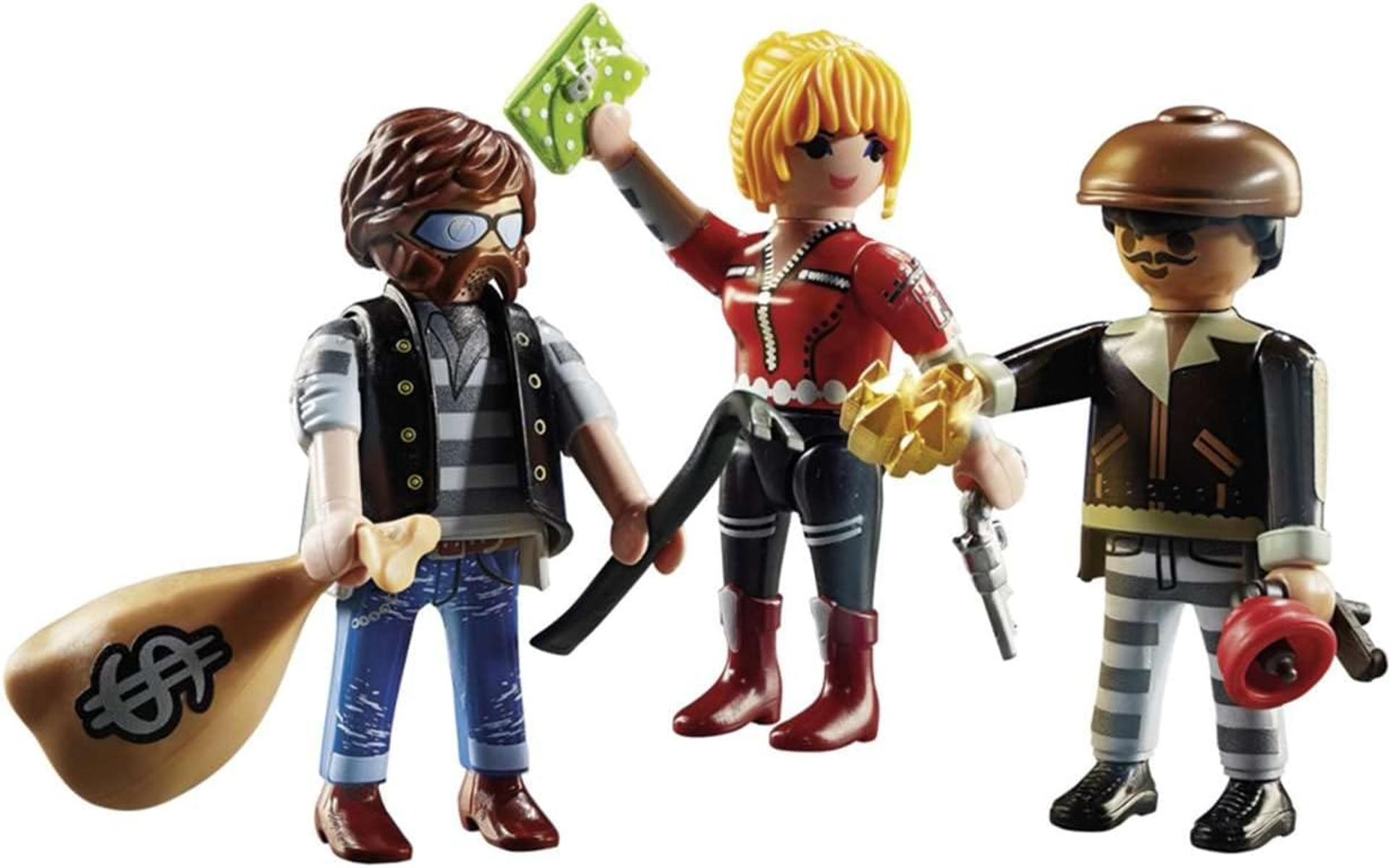 Drei Playmobil-Figuren: ein Räuber mit Geldsack, eine Frau mit grüner Geldbörse und ein Gefangener mit Pistole und Glocke.