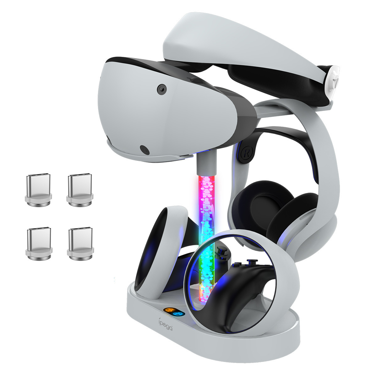 Weiß-schwarzer VR-Headset-Ständer mit Controller, Kopfhörern und Ladeanschlüssen. In der Mitte befindet sich eine leuchtende Regenbogenröhre.