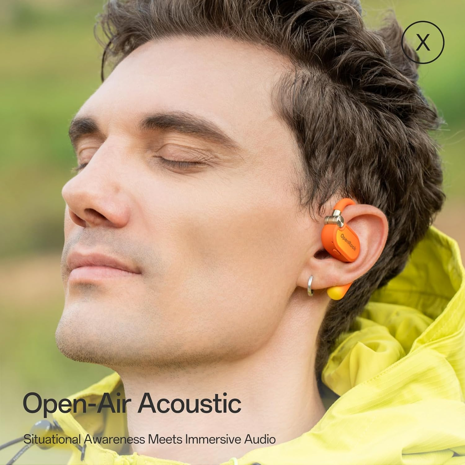A man with closed eyes wearing orange earbuds. He's in a yellow jacket. Text reads 'Open-Air Acoustic', 'Situational Awareness Meets...'.