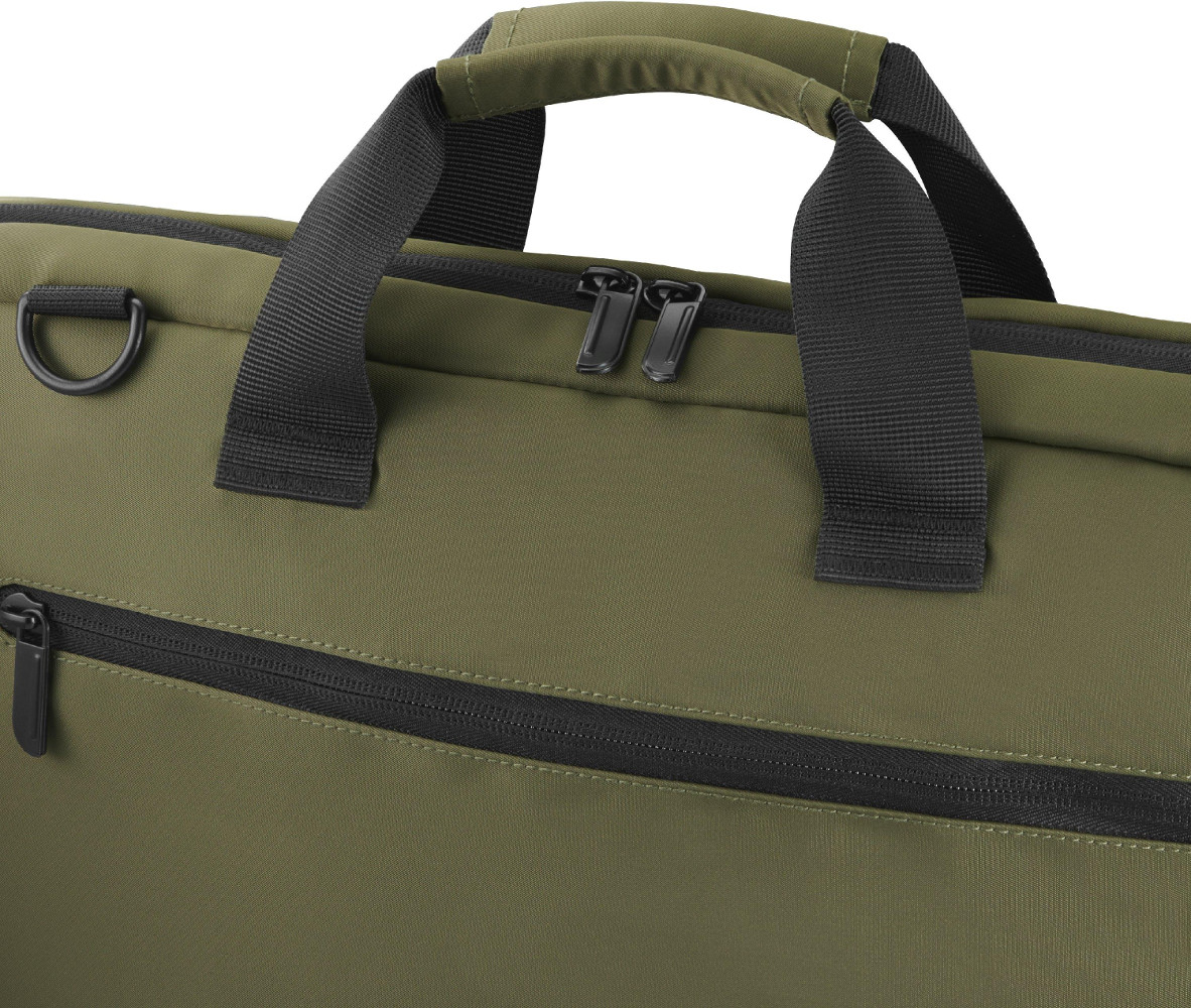 Primo piano di una borsa verde con cerniere e manici neri. Mostra un anello a D, due cerniere e un manico imbottito.