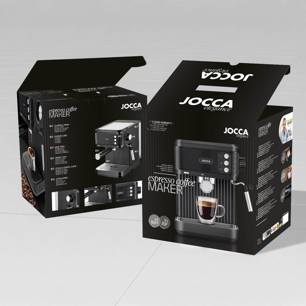 Macchina per caffè espresso nera nella sua scatola. La scatola è nera con il marchio JOCCA. È visibile un bicchiere di caffè.