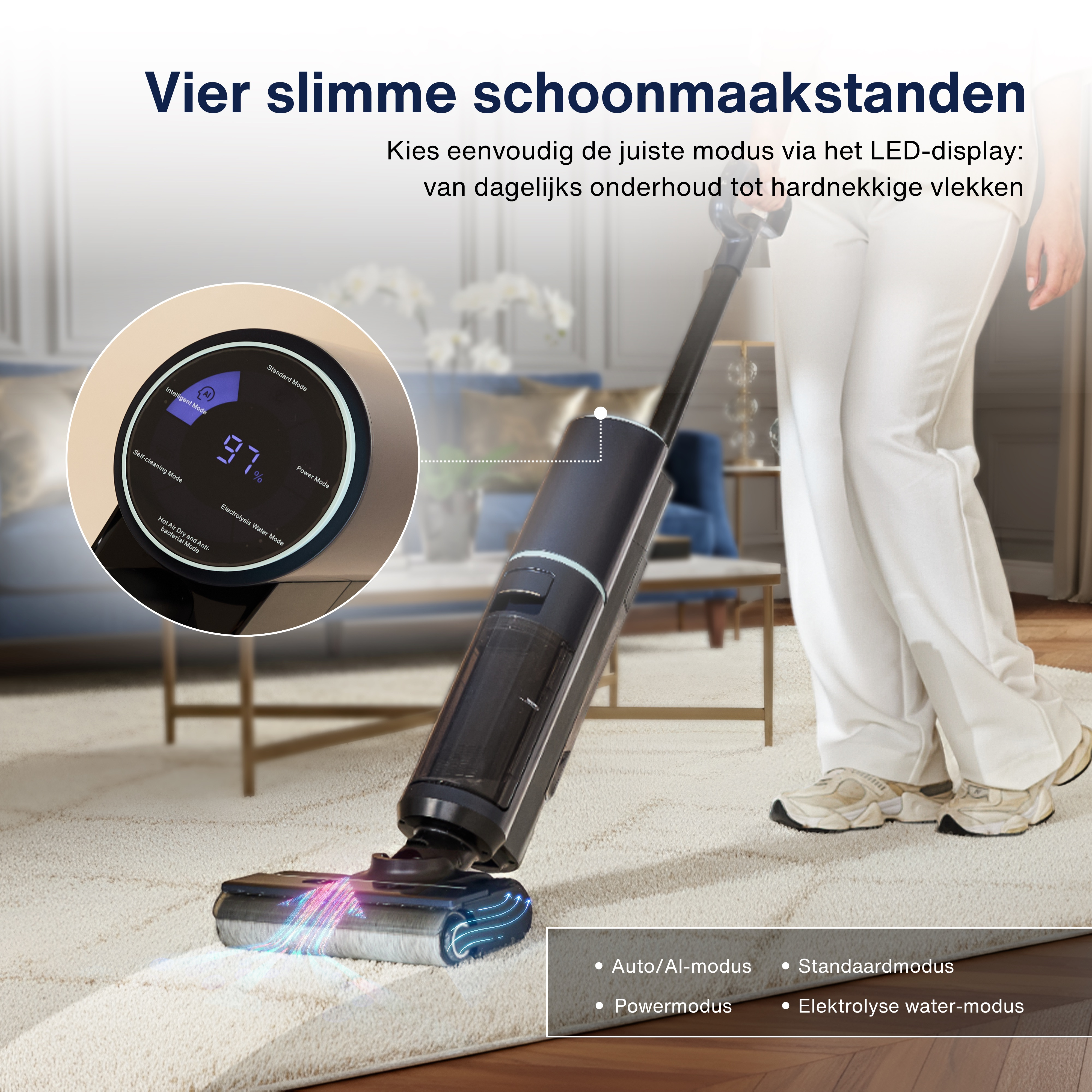 A person using a black vacuum cleaner on a light-colored rug. The device has a digital display and various cleaning modes.