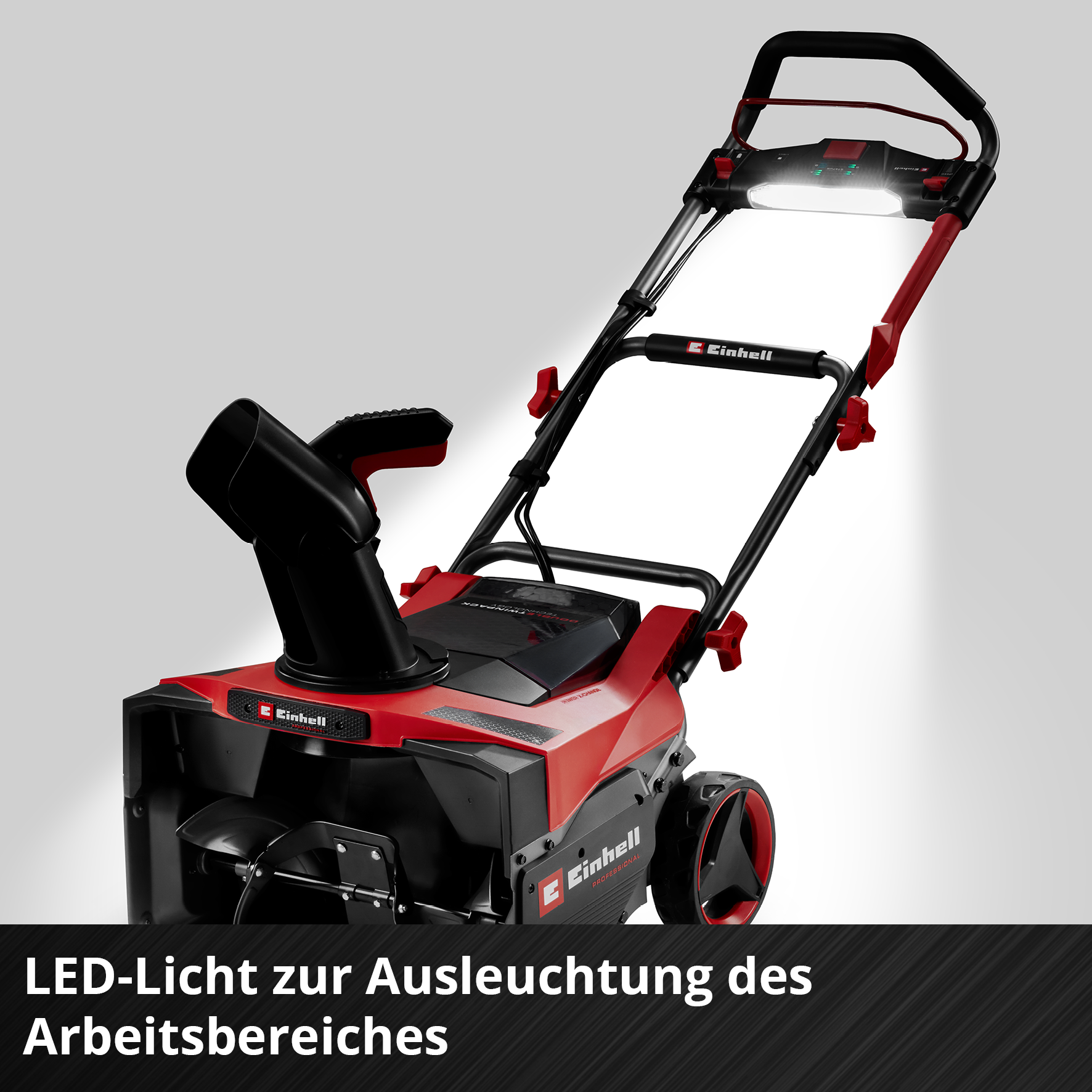 Ein roter und schwarzer Schneefräser mit LED-Licht. Der Markenname Einhell ist sichtbar.