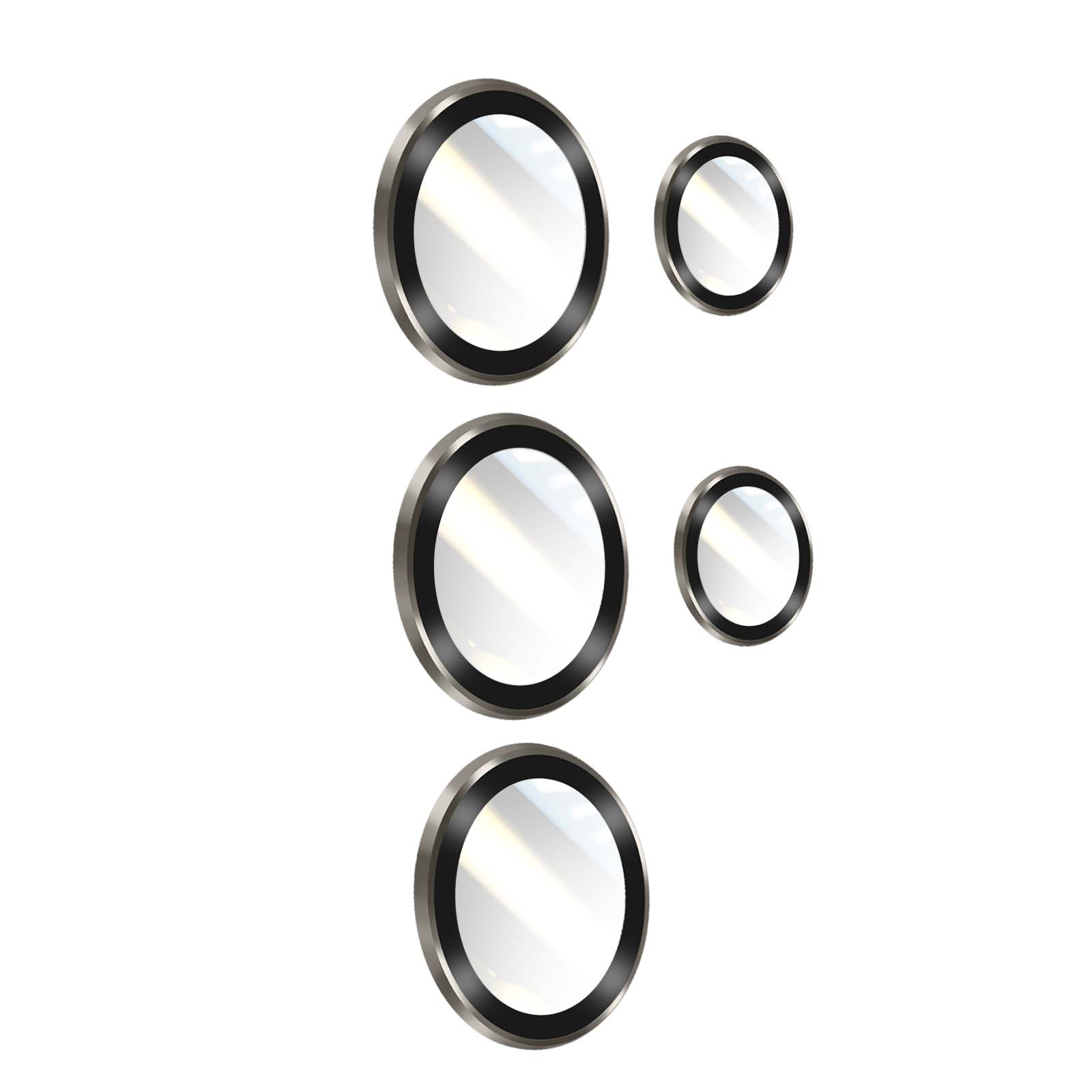 Varios elementos de lente circulares con bordes negros y plateados están dispuestos sobre un fondo blanco.