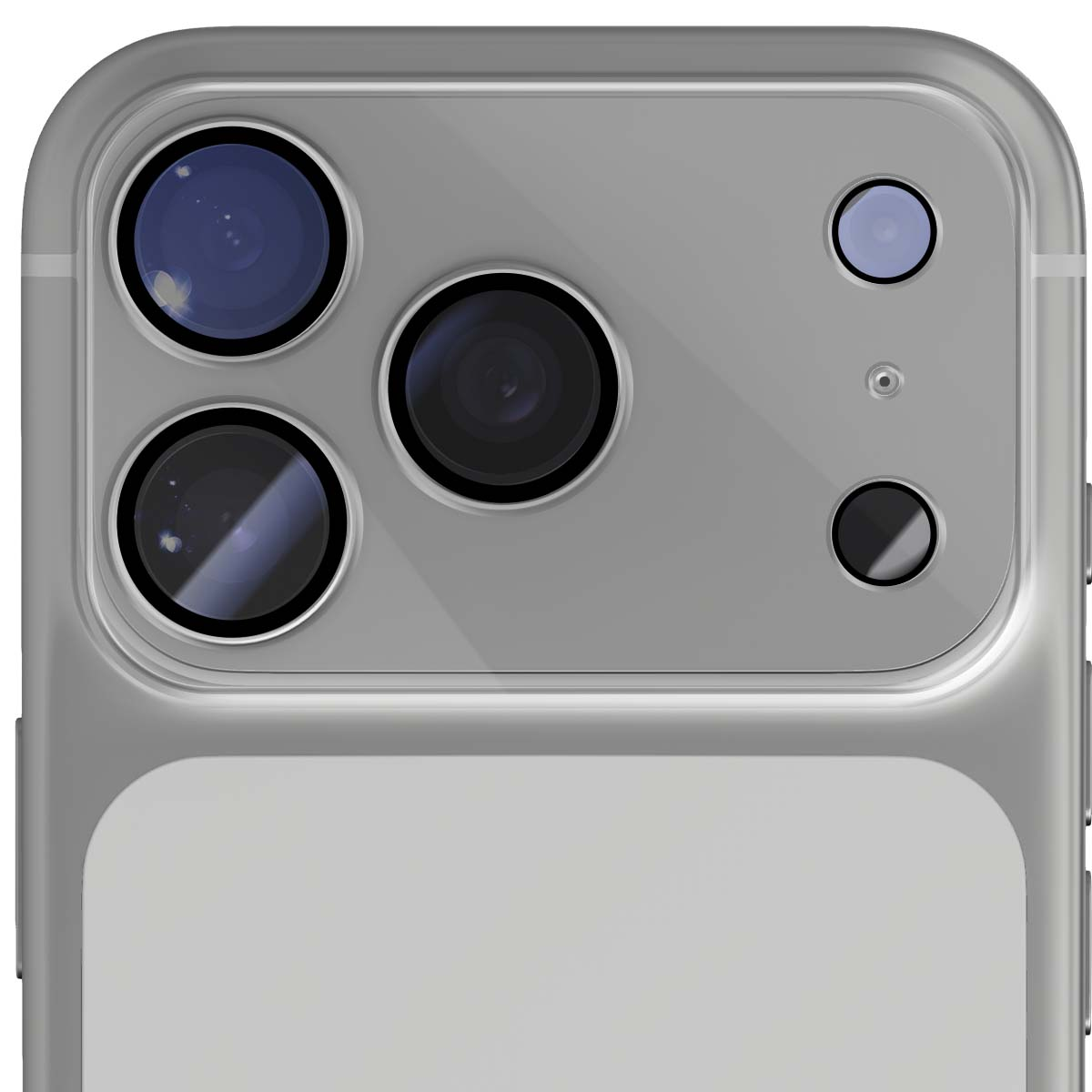 Primo piano dell'array di fotocamere di uno smartphone, con più obiettivi di varie dimensioni disposti su una superficie grigia.