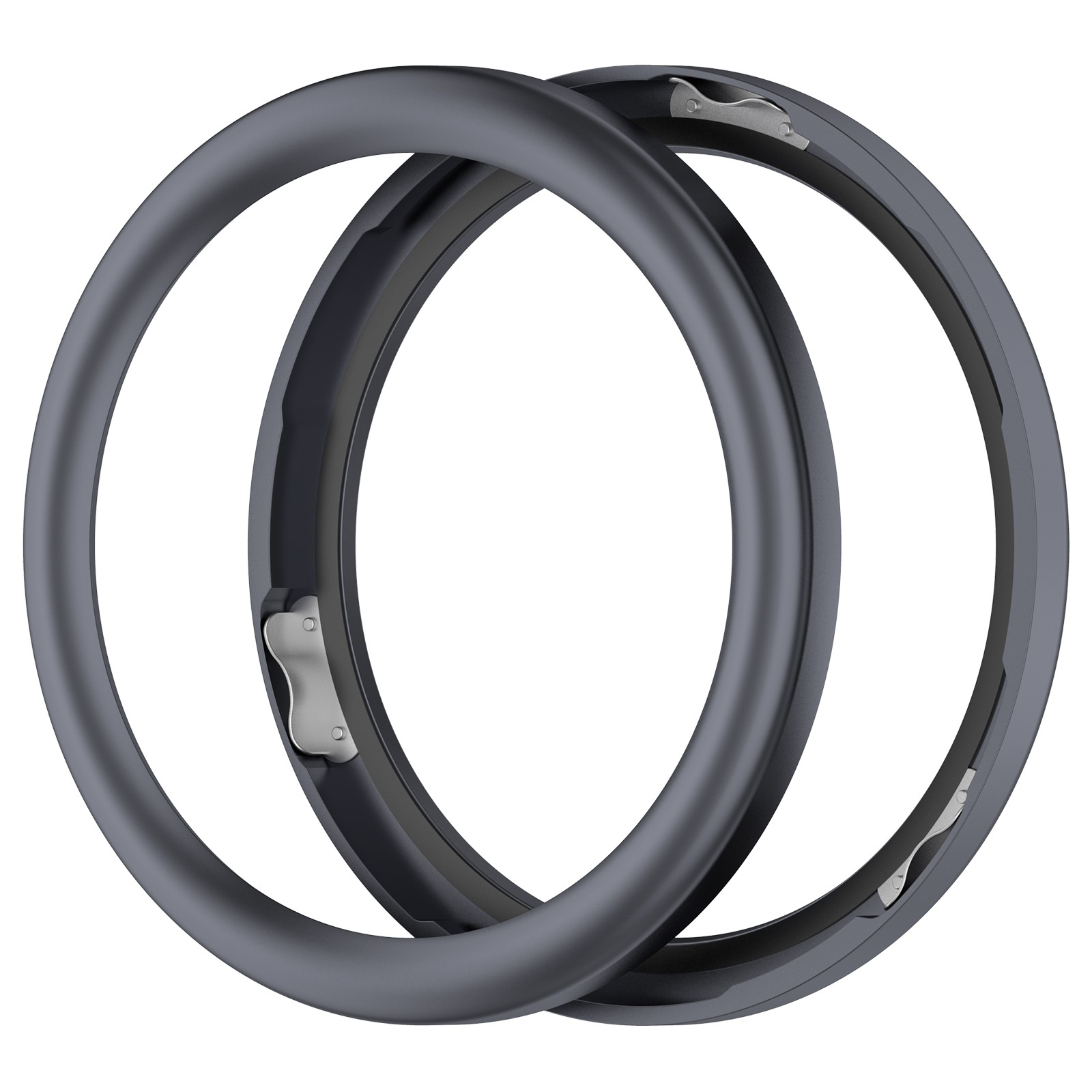 Dos objetos circulares gris oscuro superpuestos. Cada uno tiene una pieza de metal plateado adjunta.