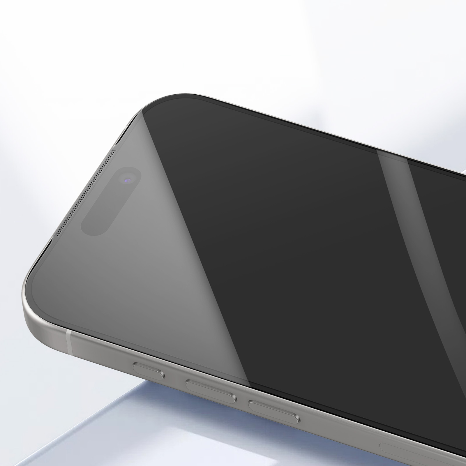 Close-up of a silver smartphone. The screen is black, with a camera and sensors at the top. Power buttons are visible.