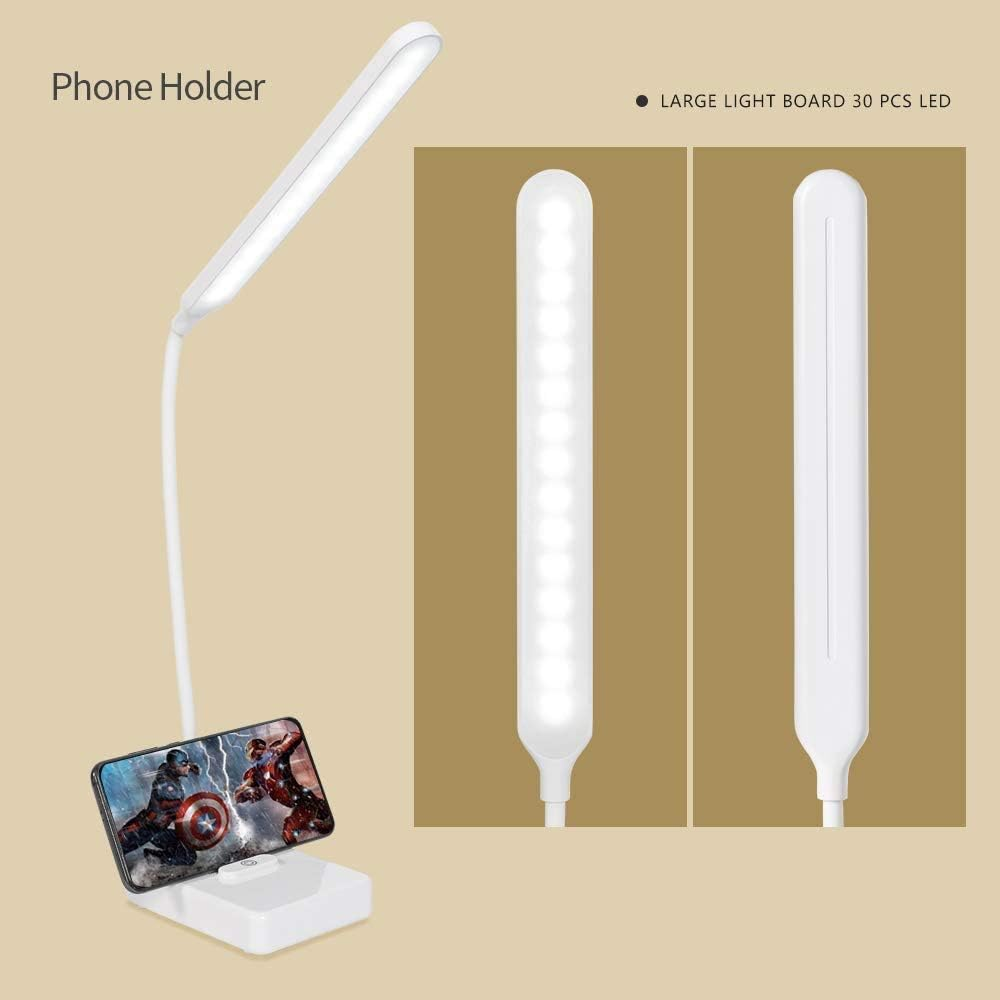 Ein weißer Telefonhalter mit flexiblem Arm, hellem LED-Licht und einem Telefon, das eine Comic-Szene zeigt, ist abgebildet.