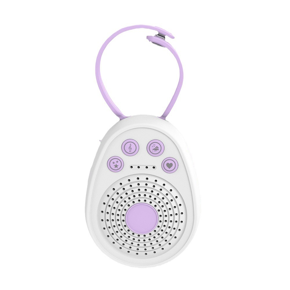 Ein weiß-lilafarbenes Baby-Soundgerät. Es hat Tasten mit Noten, Sternen und einem Herzen. Es hat eine lila Schlaufe.