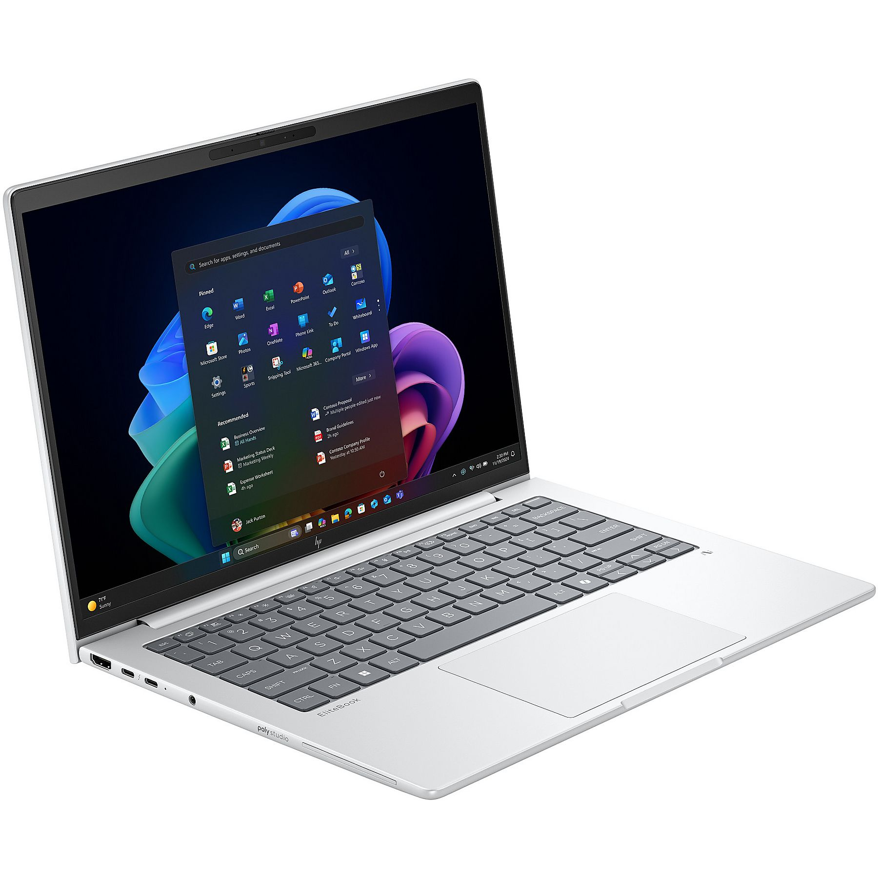 Laptop argentato con applicazioni Windows. Tastiera visibile. Lo schermo mostra icone di app. Un'icona del tempo soleggiato è nell'angolo.