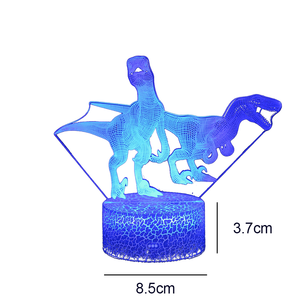 Eine blaue Dinosaurierlampe mit zwei Dinosaurierfiguren auf einem runden Sockel, Abmessungen neben dem Bild angegeben.
