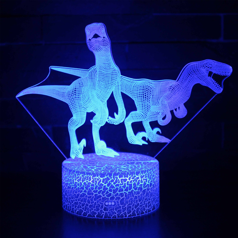 Ein 3D-Dinosaurier-Nachtlicht. Zwei Dinosaurier sind blau und lila beleuchtet. Die Basis ist ein zylindrischer Sockel.