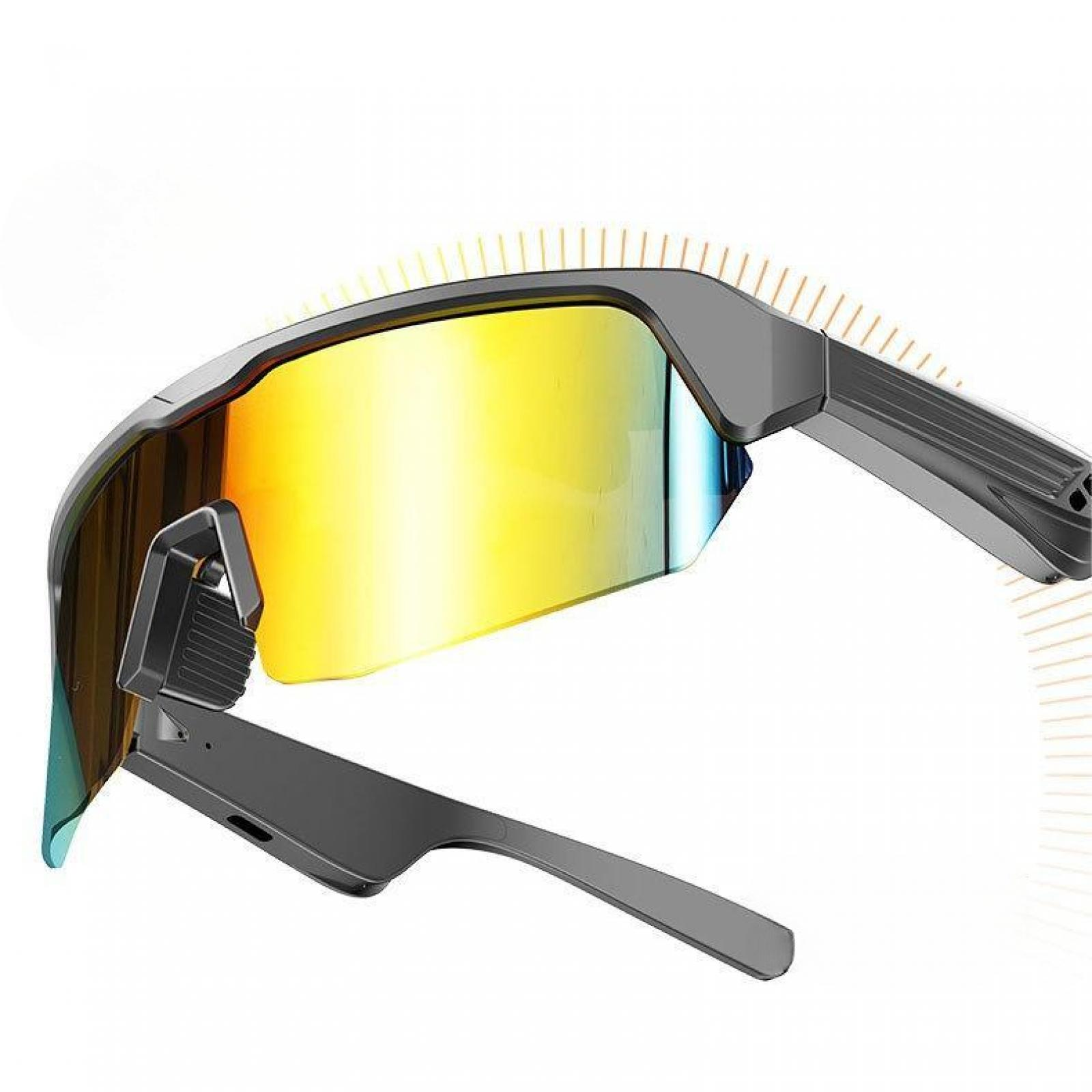 Sportsonnenbrille mit gelb getönten Gläsern und grauen Rahmen. Die Brille hat ein schlankes, modernes Design.