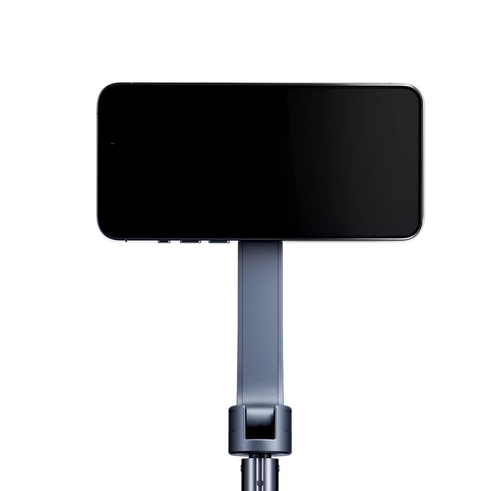 Smartfon z czarnym ekranem zamontowany na szarej podstawie, na białym tle.