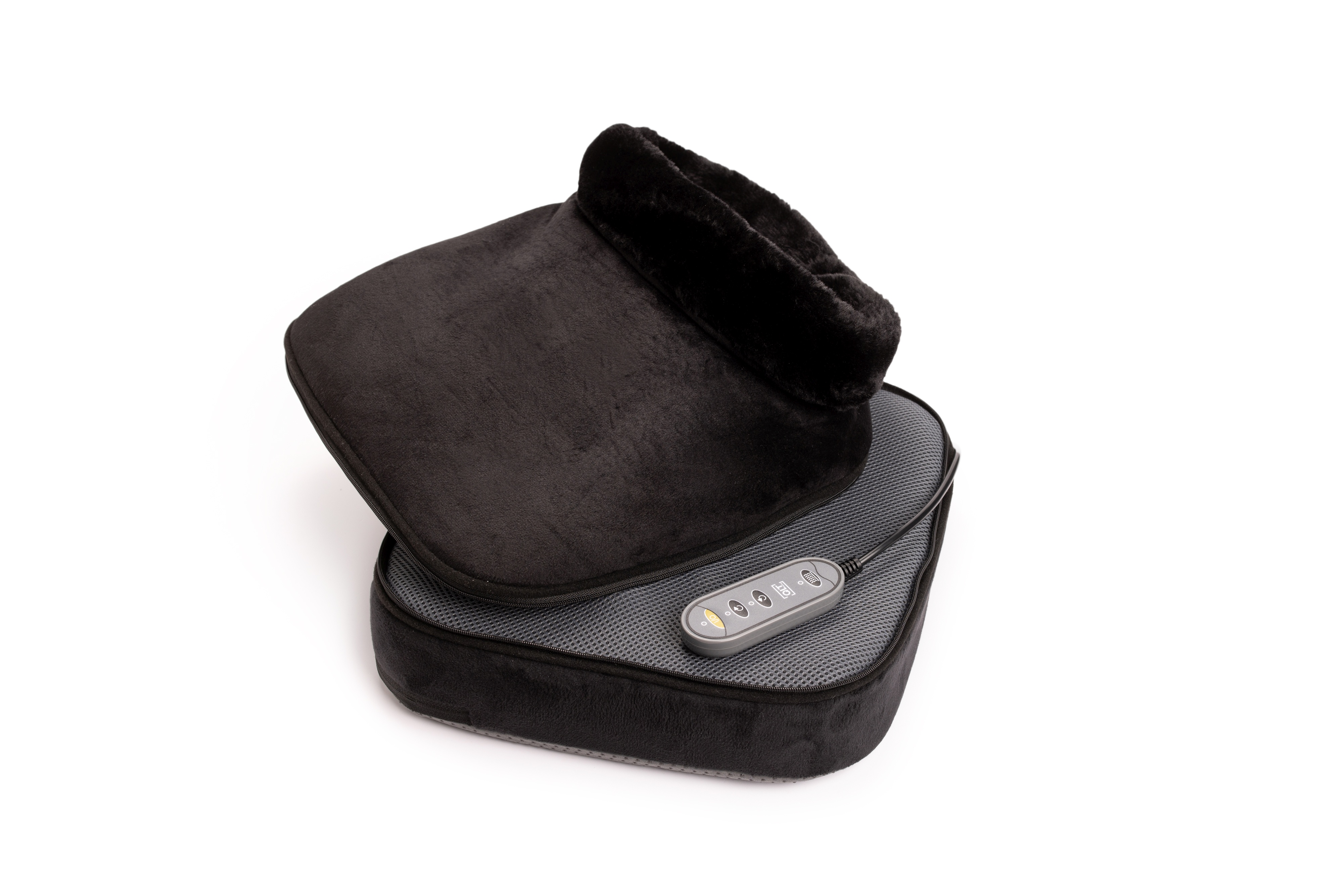 A black foot warmer with a control panel is on a white surface. It has a plush interior and a mesh base.