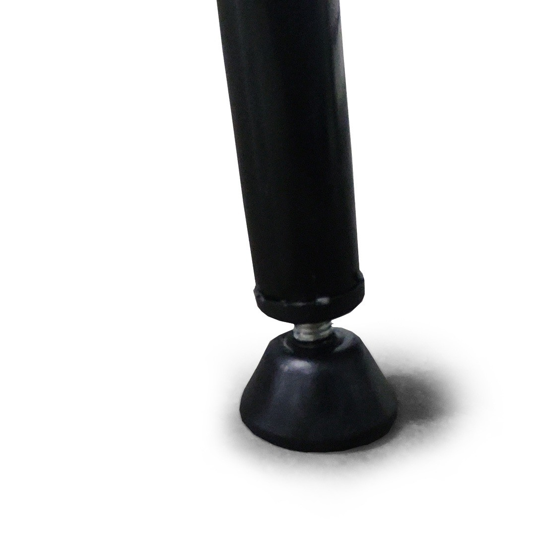 A close-up of a black table leg. The leg is cylindrical and tapers to a black, cone-shaped foot on a white surface.