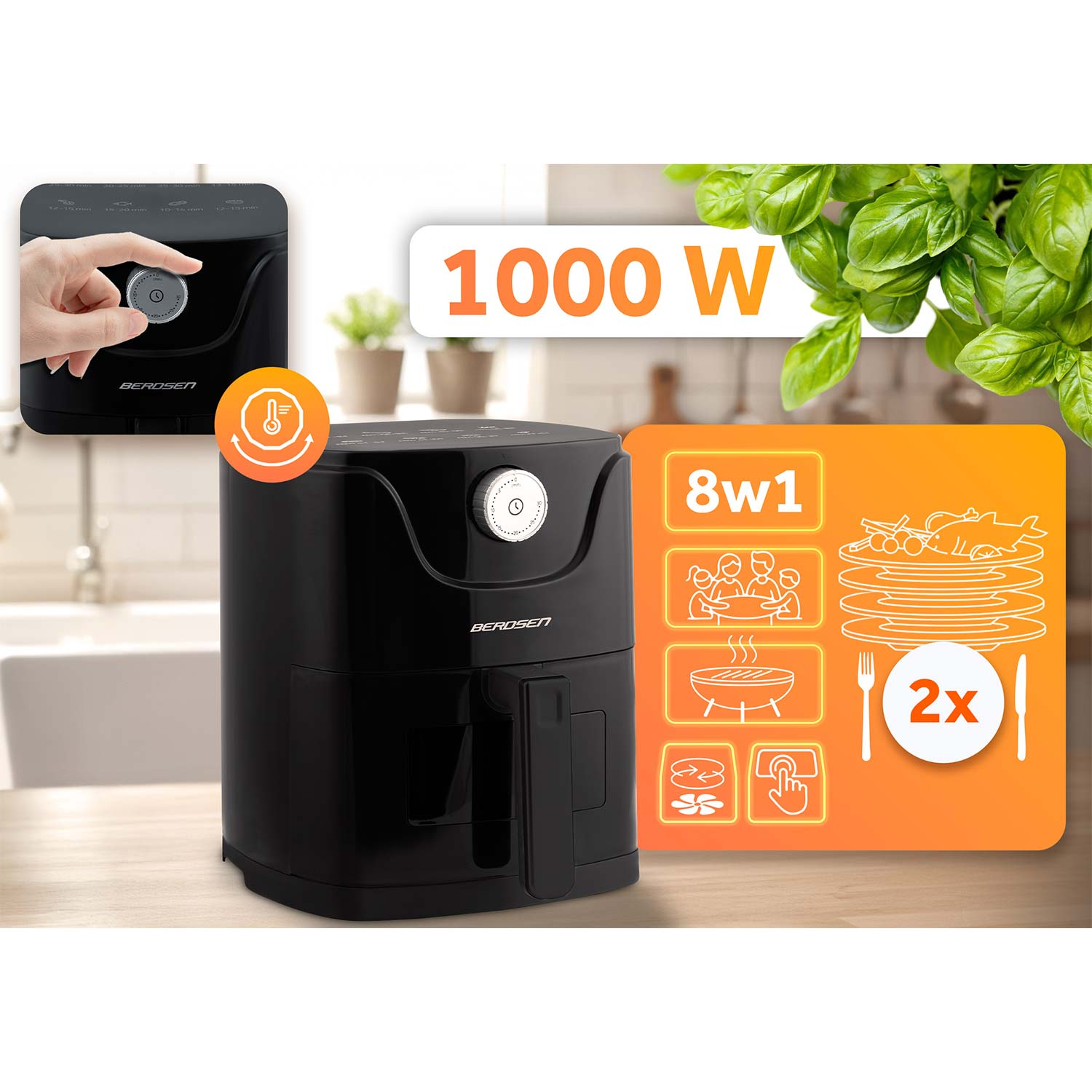 Czarna frytownica powietrzna z ekranem dotykowym. Ma moc 1000W i kilka trybów gotowania. Liście bazylii widoczne w tle.