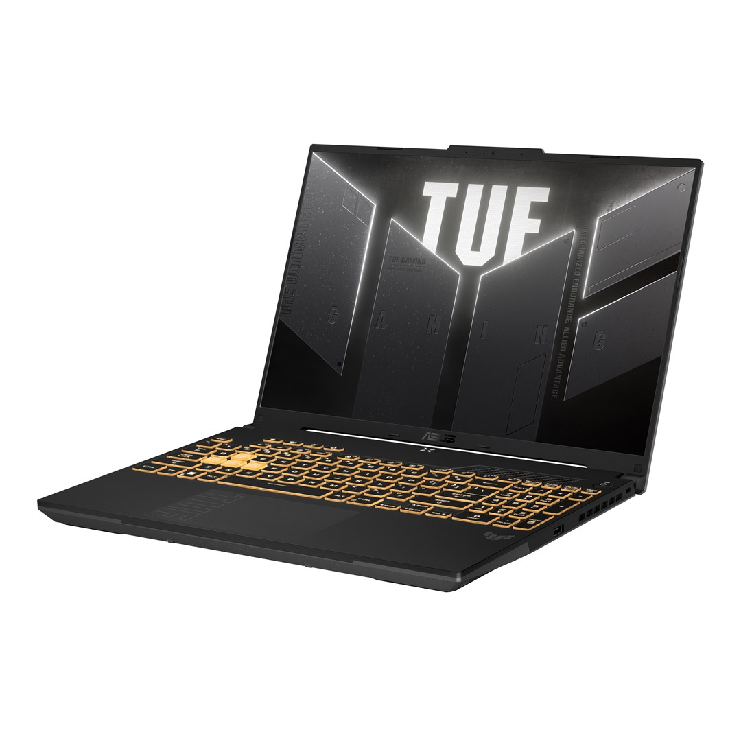 Czarny i złoty laptop do gier ASUS TUF. Otwarty, pokazujący ekran z logo TUF. Klawiatura jest złota.