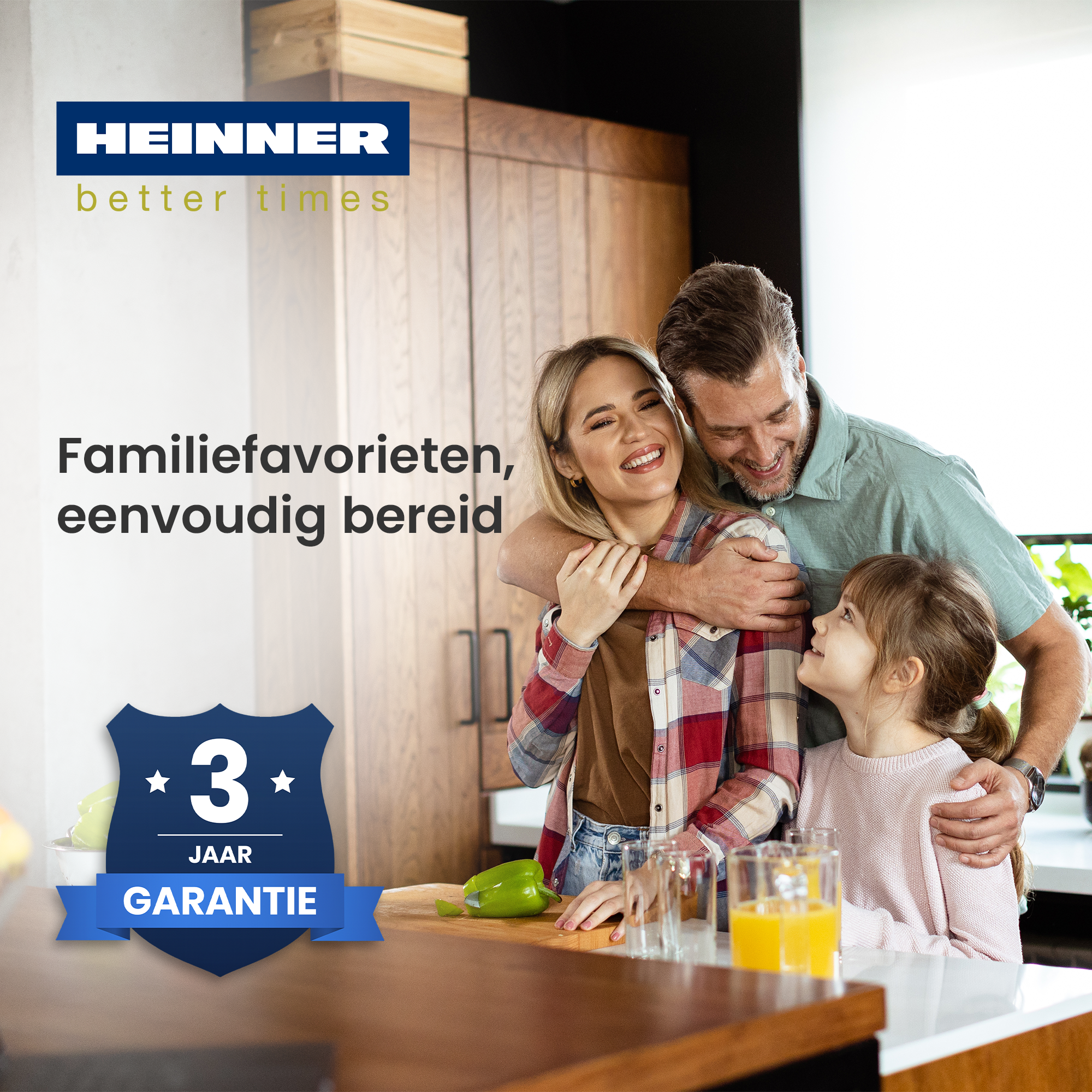 Family smiling in kitchen. Woman chopping pepper. Text: Family favorites, simply prepared. Logo: Heinner better times. 3 year warranty.