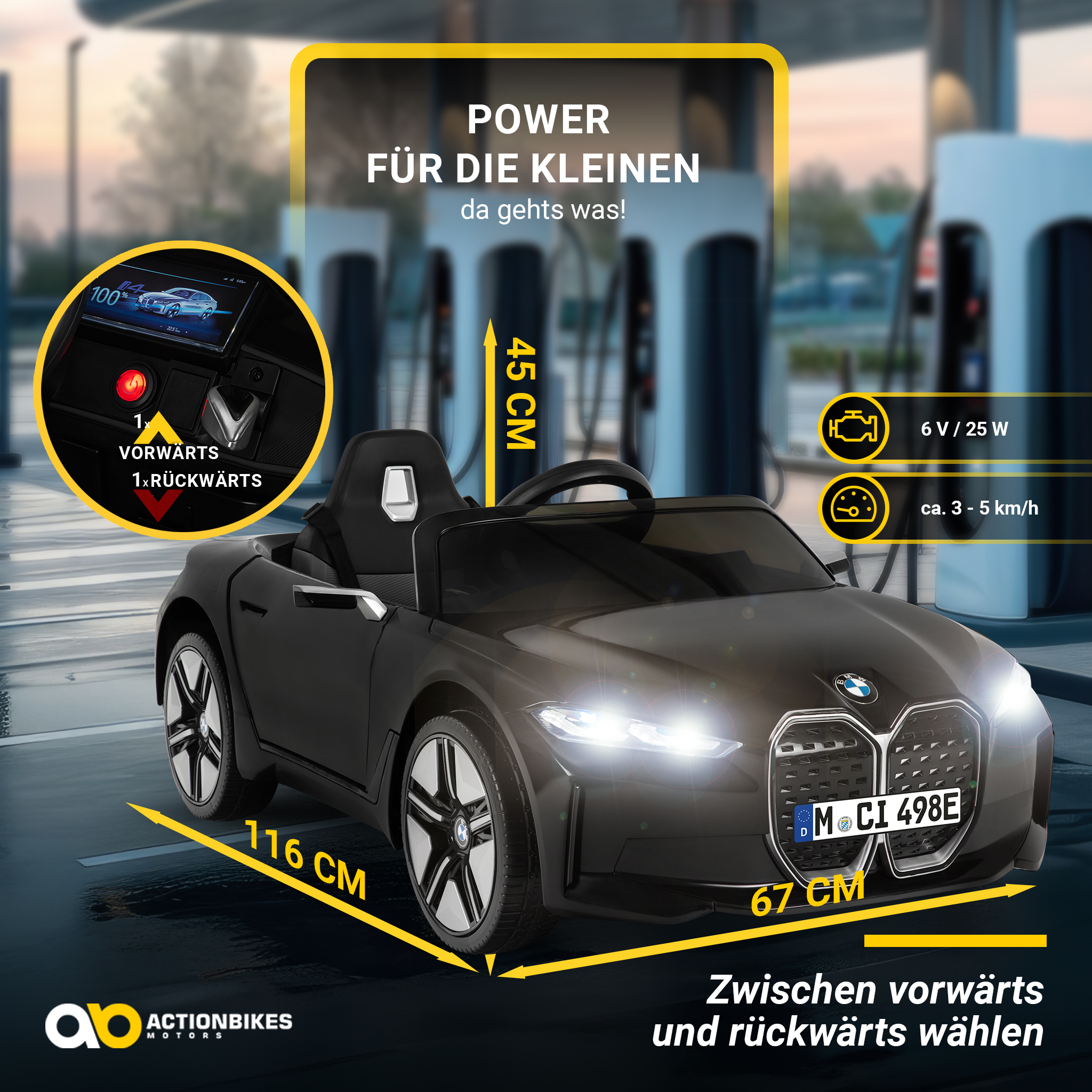 Schwarzes Spielzeug-BMW-Auto mit Abmessungen und Spezifikationen, mit Ladestationen im Hintergrund.
