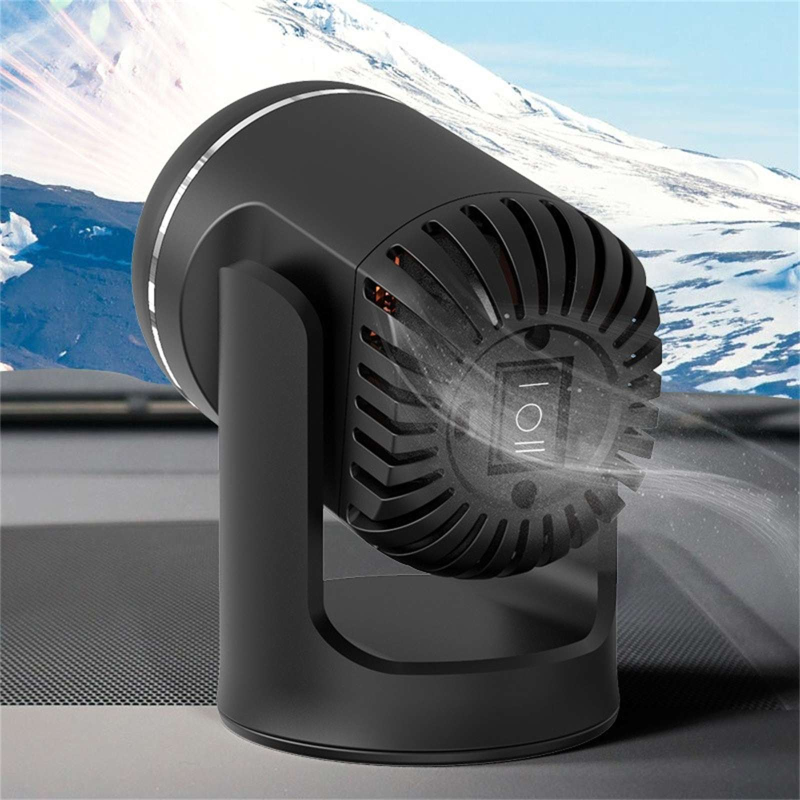 Schwarzer Ventilator mit Schalter, der Luft bläst. Der Hintergrund hat ein Gebirge.