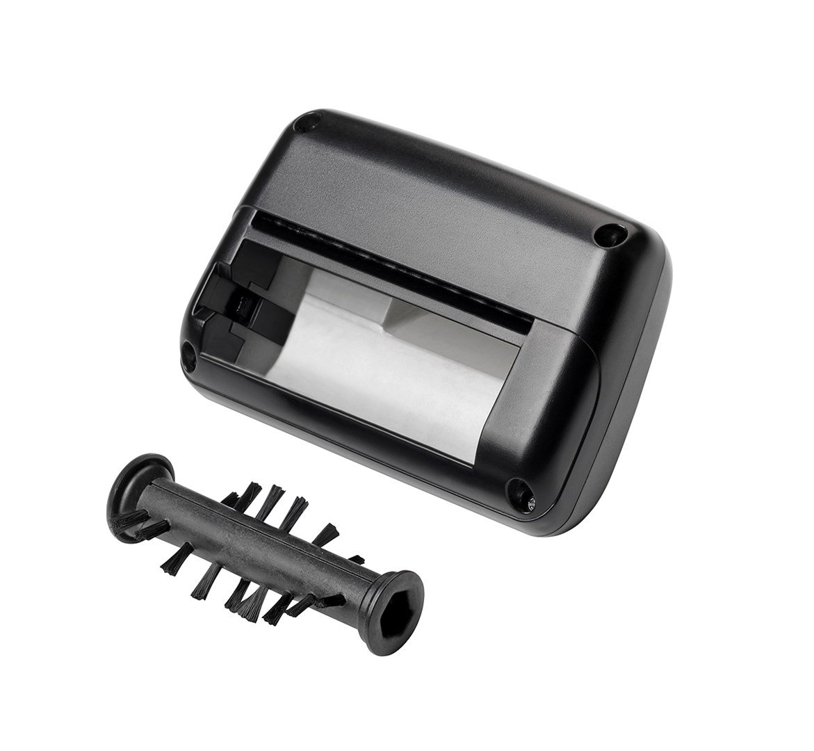 Czarny plastikowy przedmiot z odłączoną szczotką rolkową. Urządzenie ma prostokątny kształt z otworem. Białe tło.