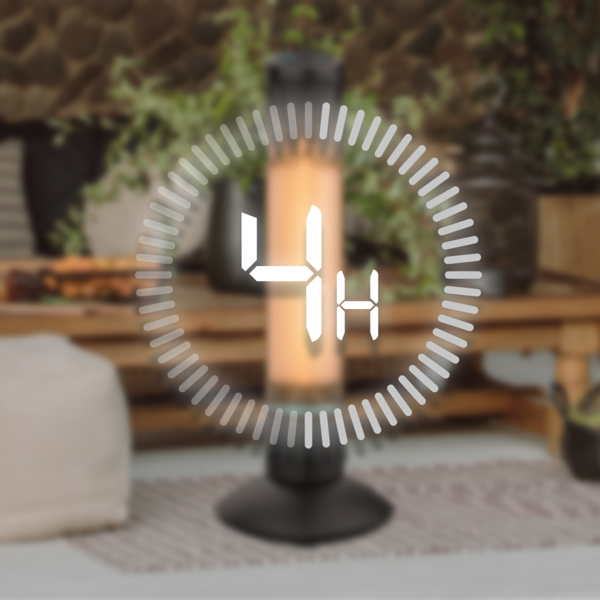 Wyświetlacz grzejnika z timerem 4H. Znajduje się na patio, z roślinami, stołem i dekoracyjnym dywanem.