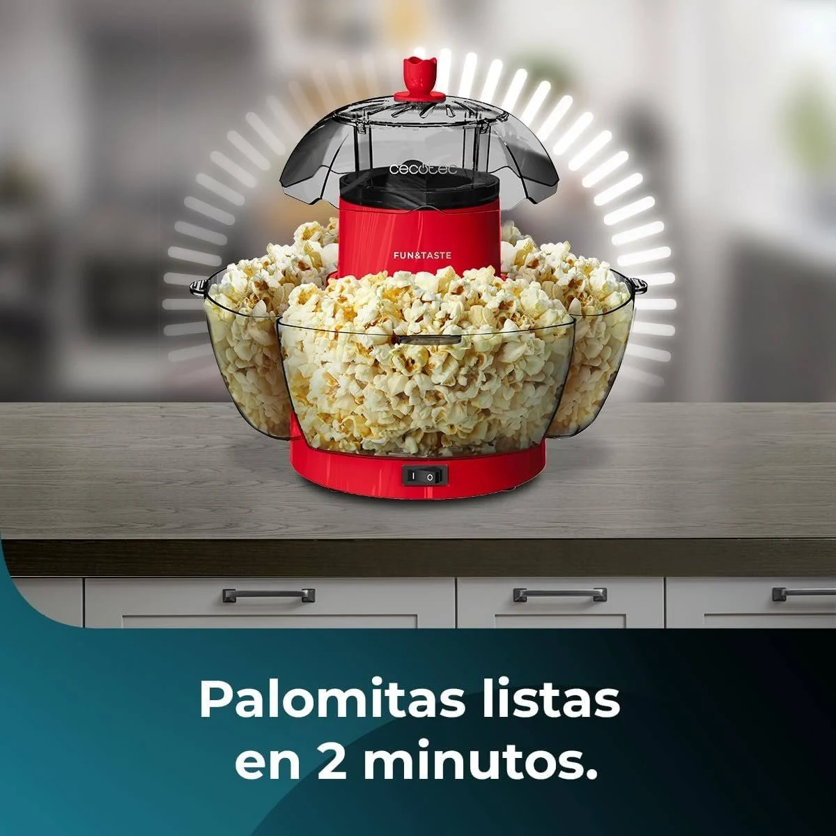 Una macchina per popcorn rossa con popcorn in ciotole trasparenti. Il testo in basso dice: Palomitas listas en 2 minutos.