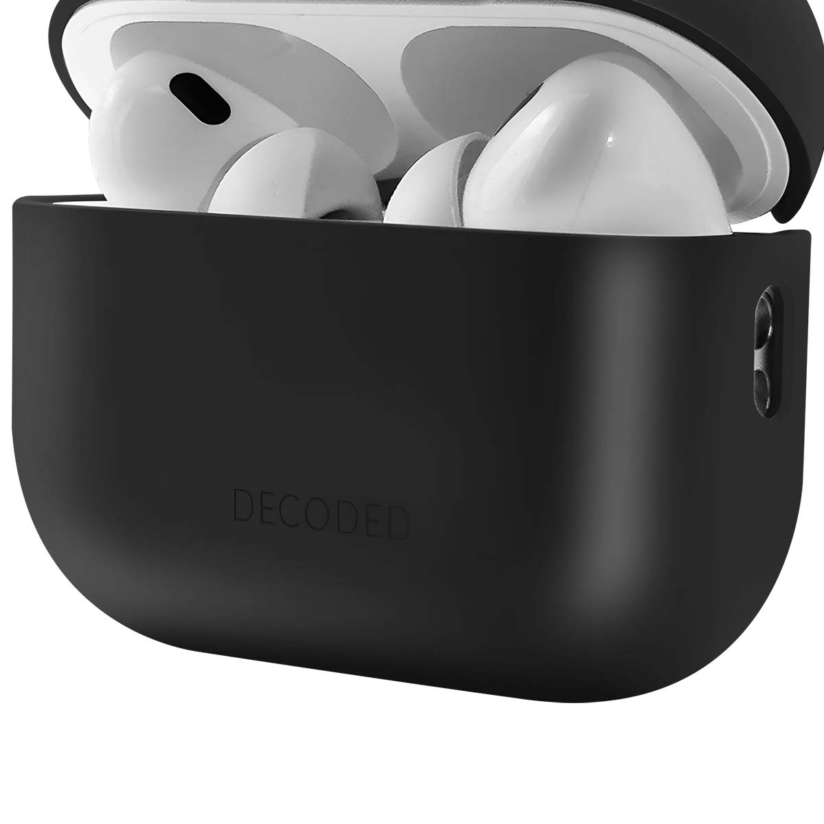 Black earbud case with white earbuds inside. The case is open, showing earbuds. The brand 'DECODED' is on the case.